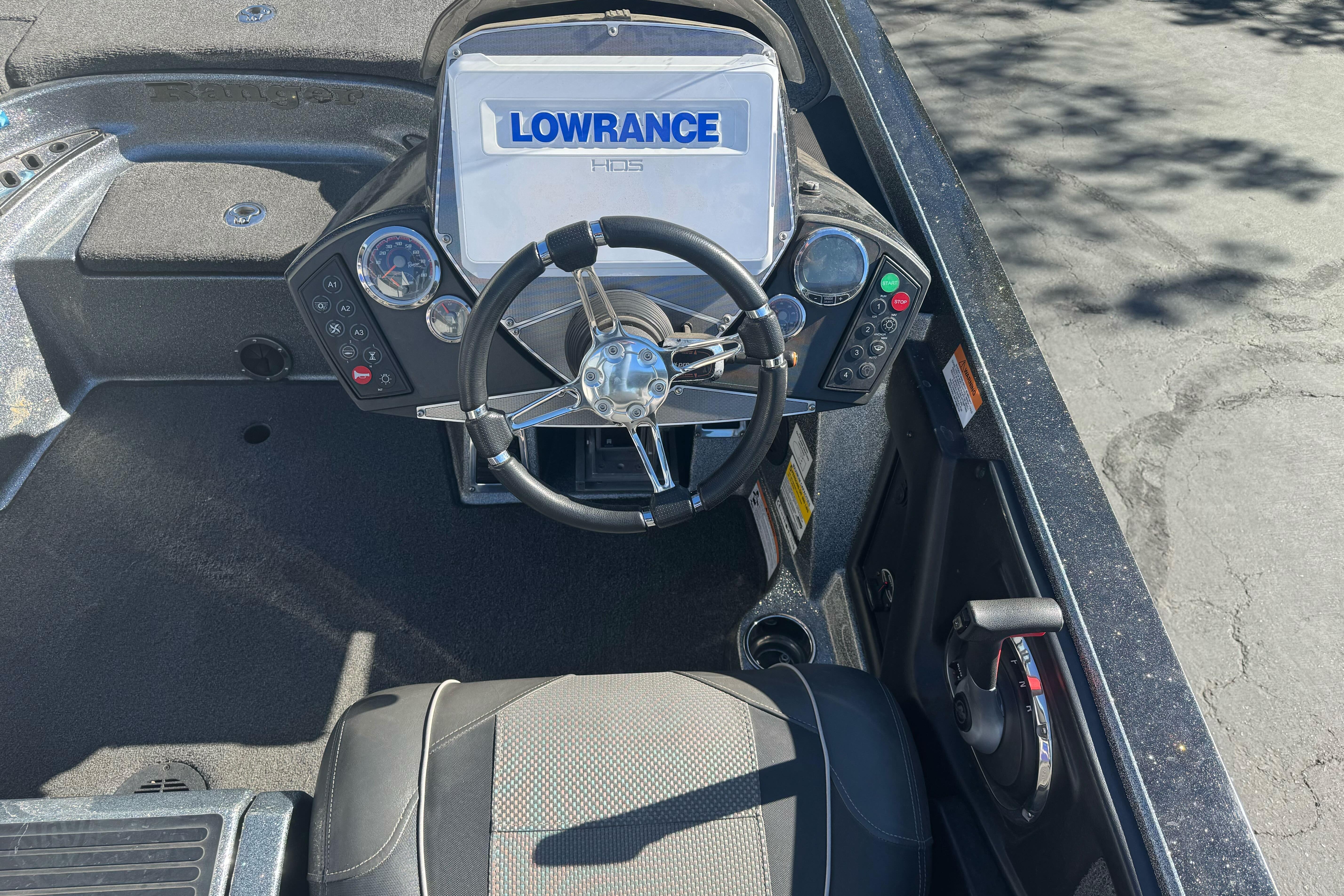 2020 Ranger Z521C boat cockpit with Lowrance HDS display and steering wheel.