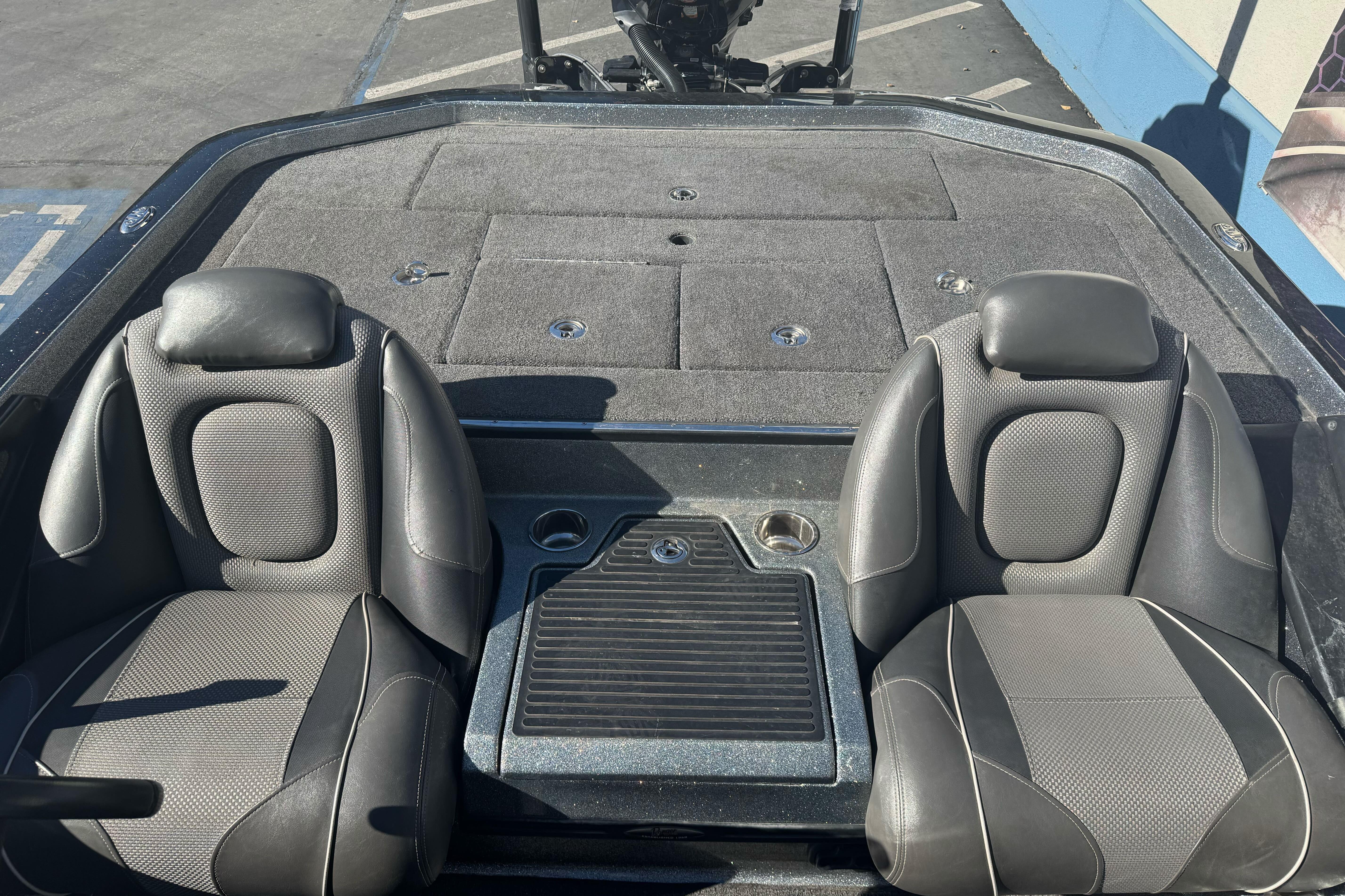2020 Ranger Z521C Ranger Cup boat interior with dual seats and storage compartments.