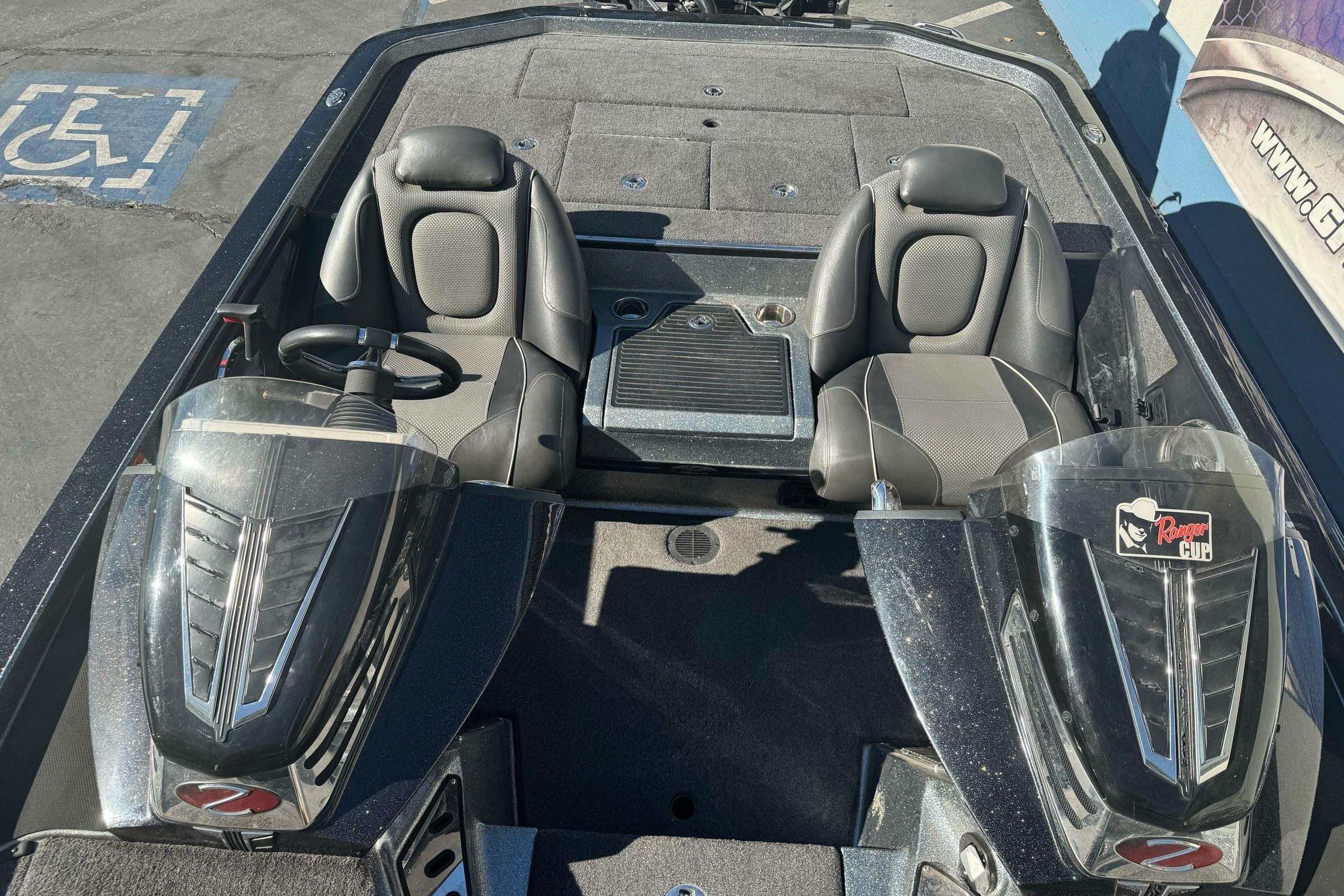 2020 Ranger Z521C Ranger Cup Equipped boat interior with dual seats and steering console.