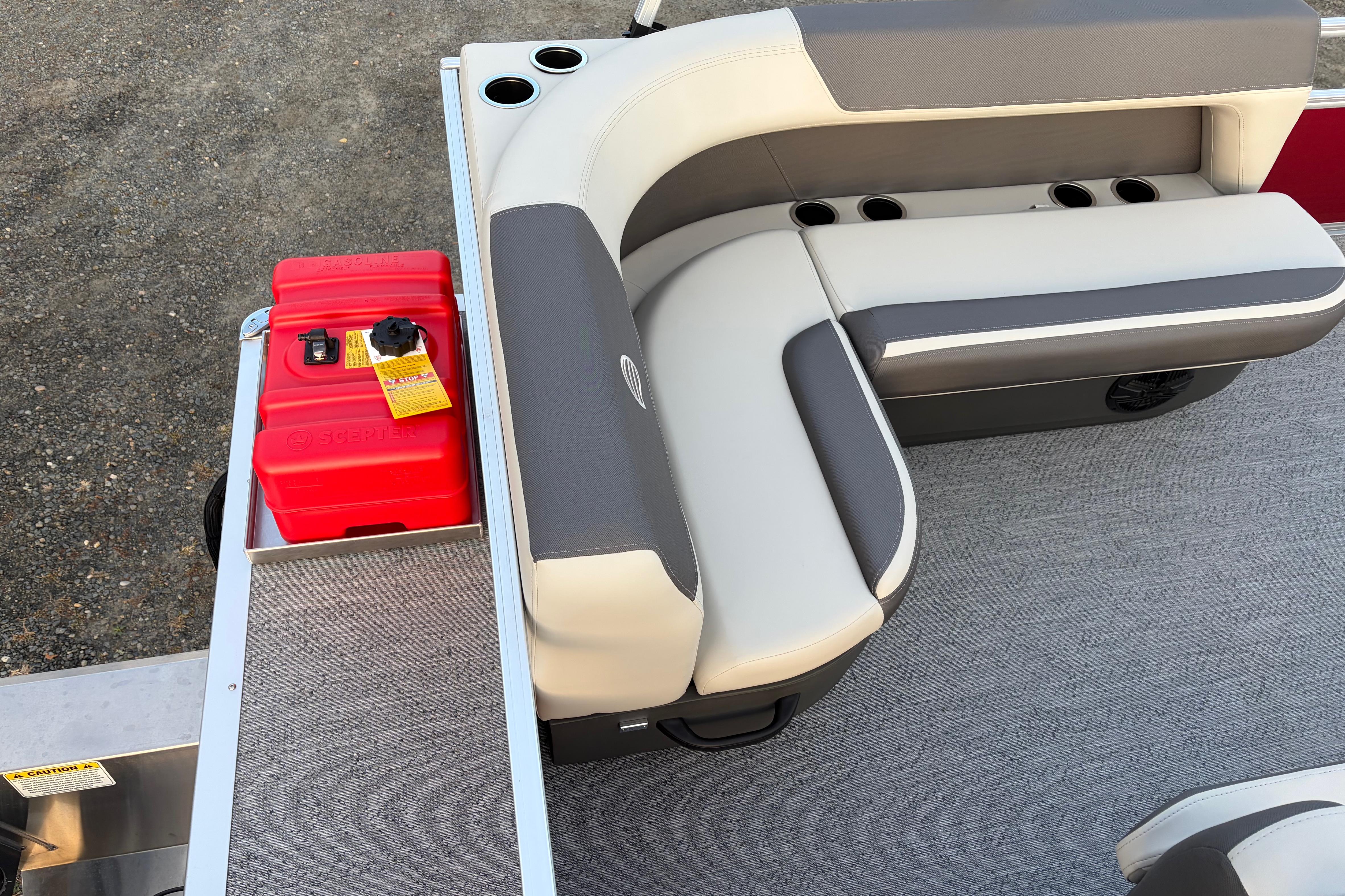 2026 Sun Tracker Bass Buggy 16 XL Select pontoon with seating and red fuel tank.