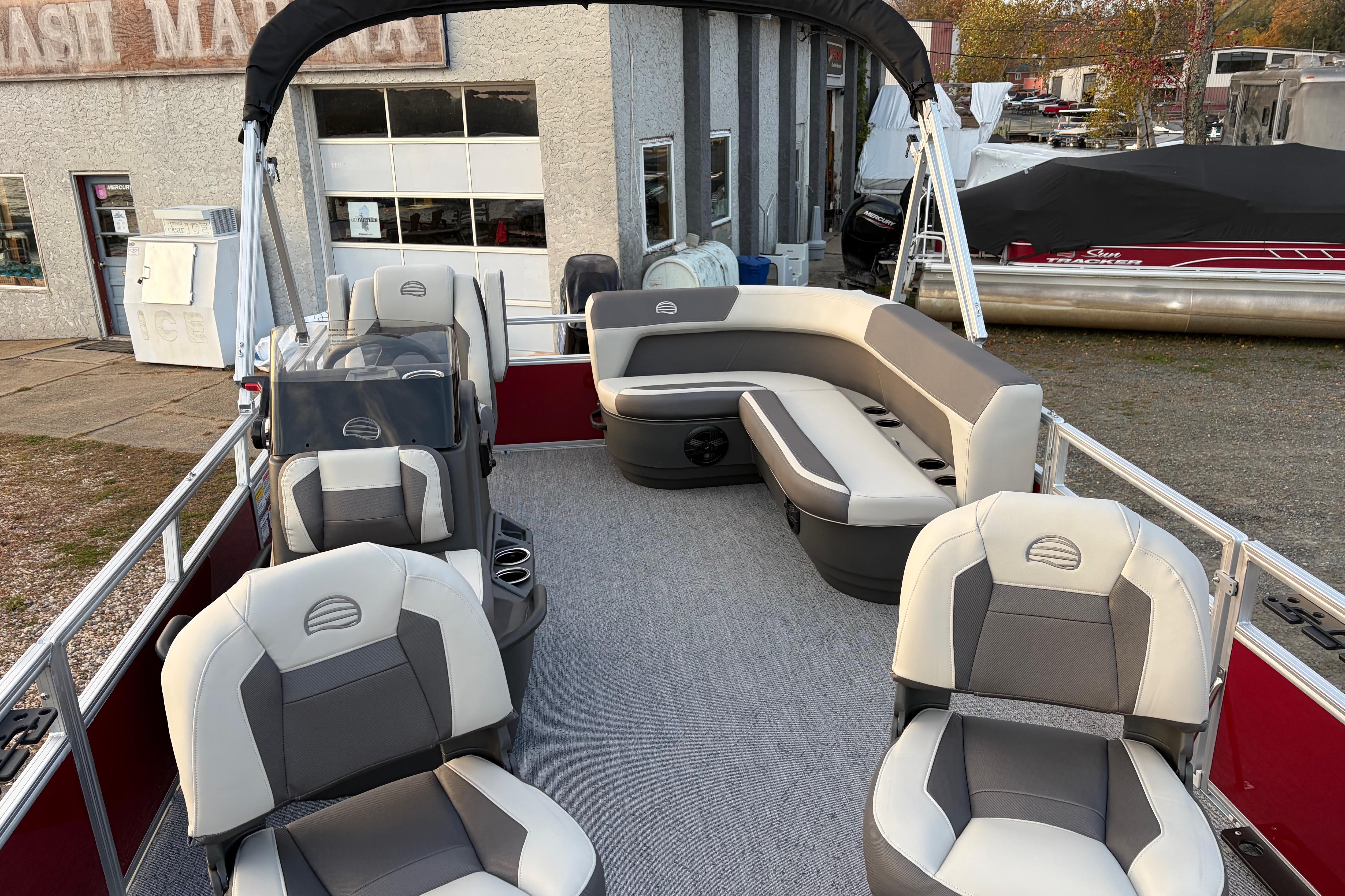 2026 Sun Tracker Bass Buggy 16 XL Select pontoon boat with spacious seating and modern design.