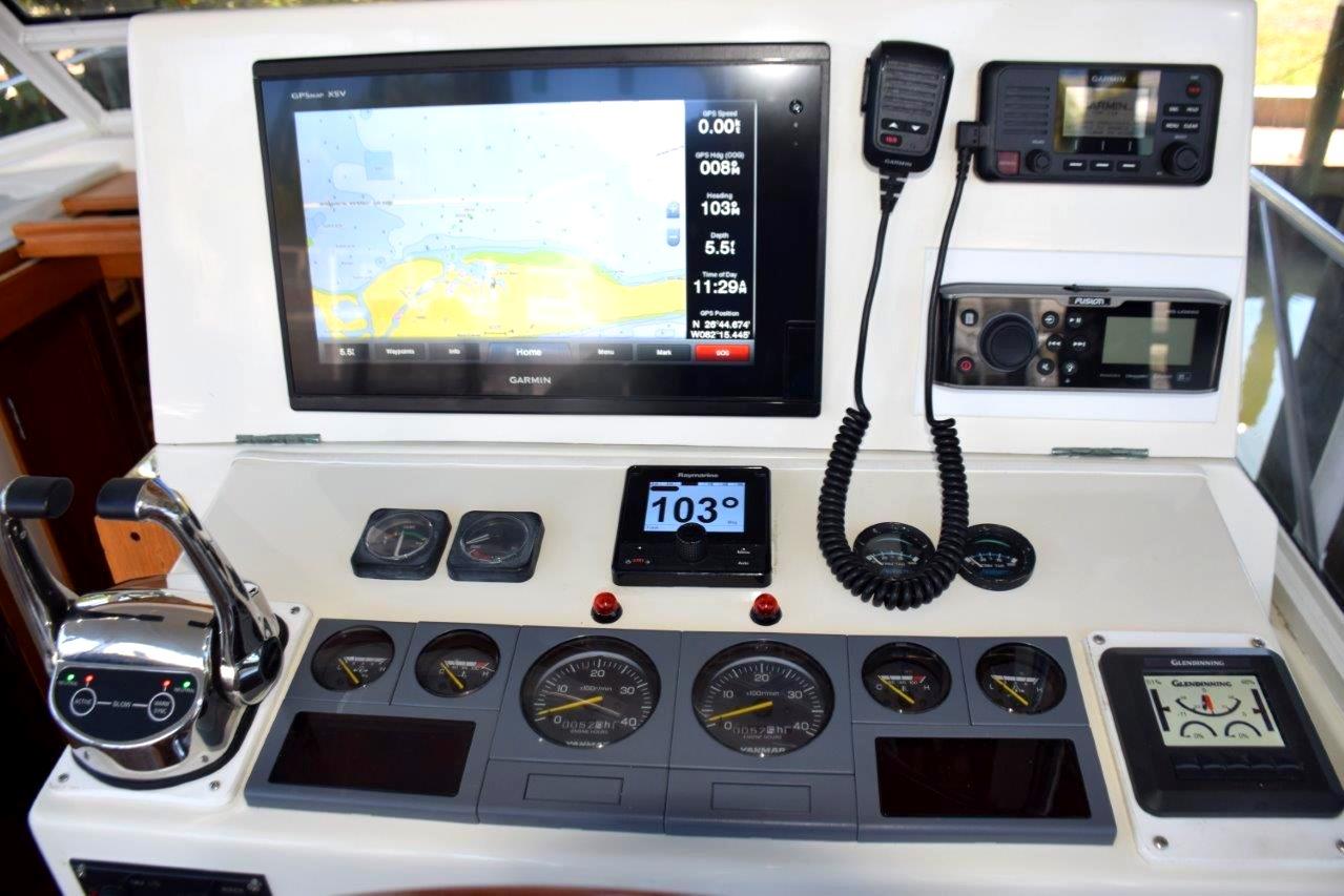 Helm with Garmin MFD, VHF radio, and Autopilot