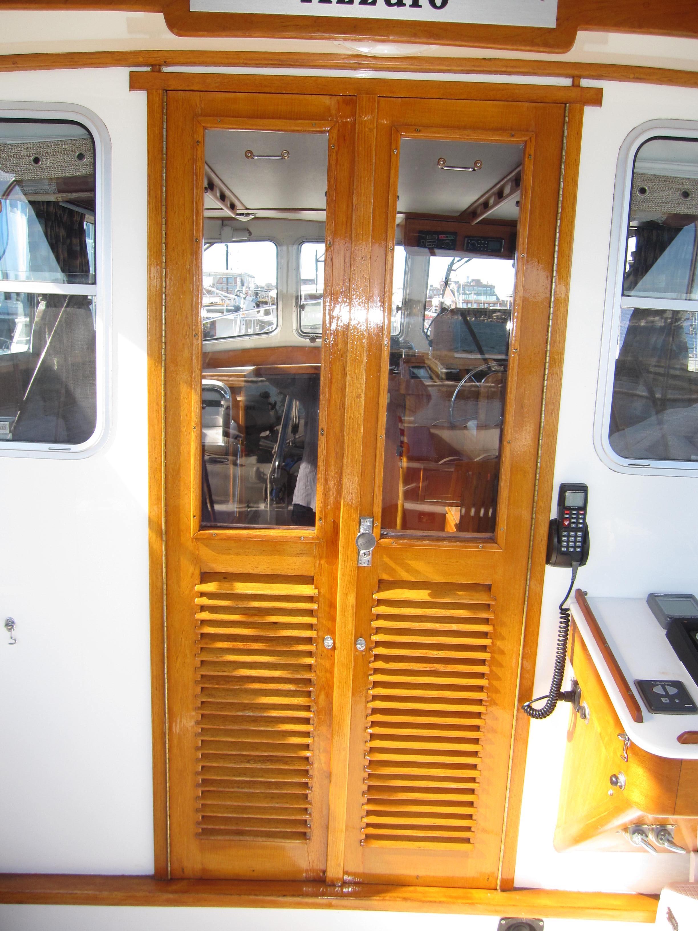 1990 Blue Seas 31 Hardtop Cruiser wooden cabin doors.