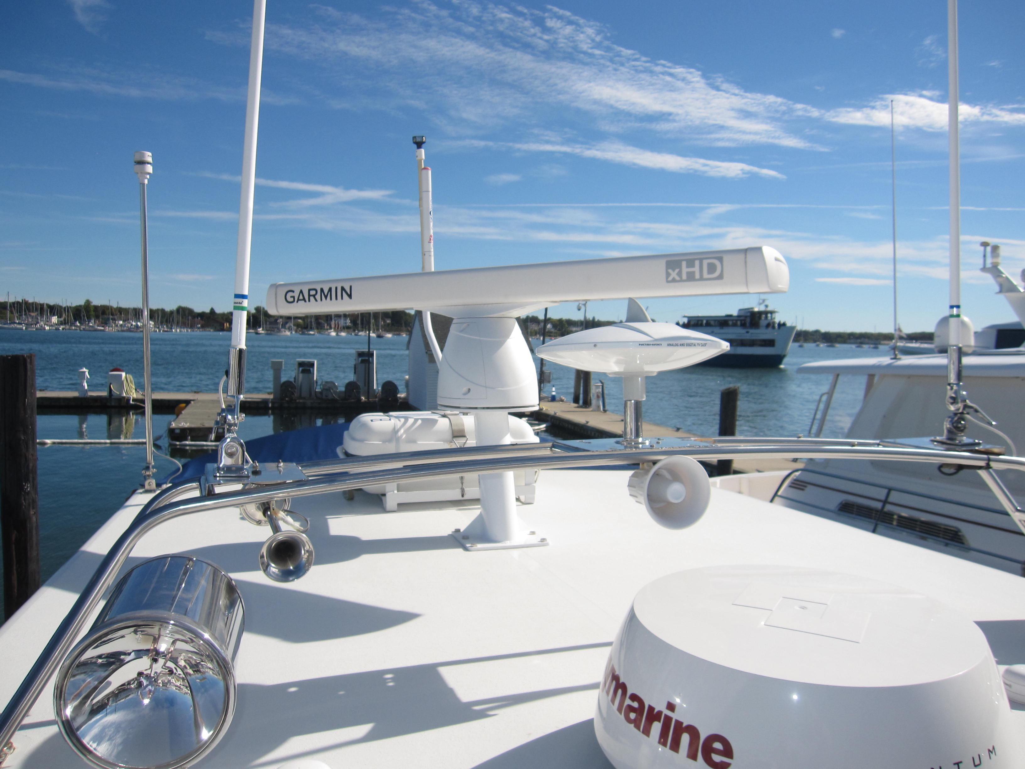Close-up of 1990 Blue Seas 31 Hardtop Cruiser with Garmin radar system.