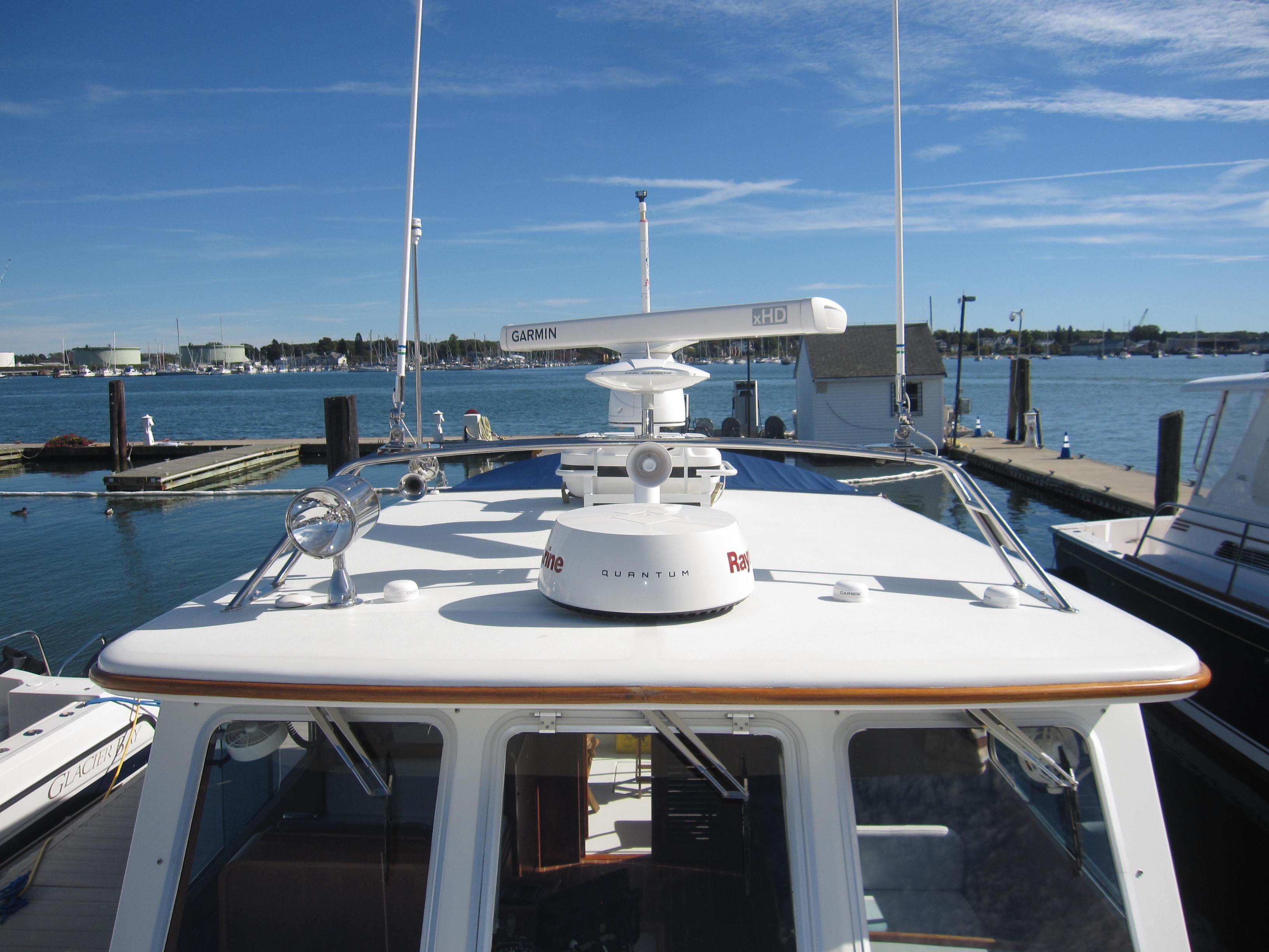 1990 Blue Seas 31 Hardtop Cruiser docked at a marina.