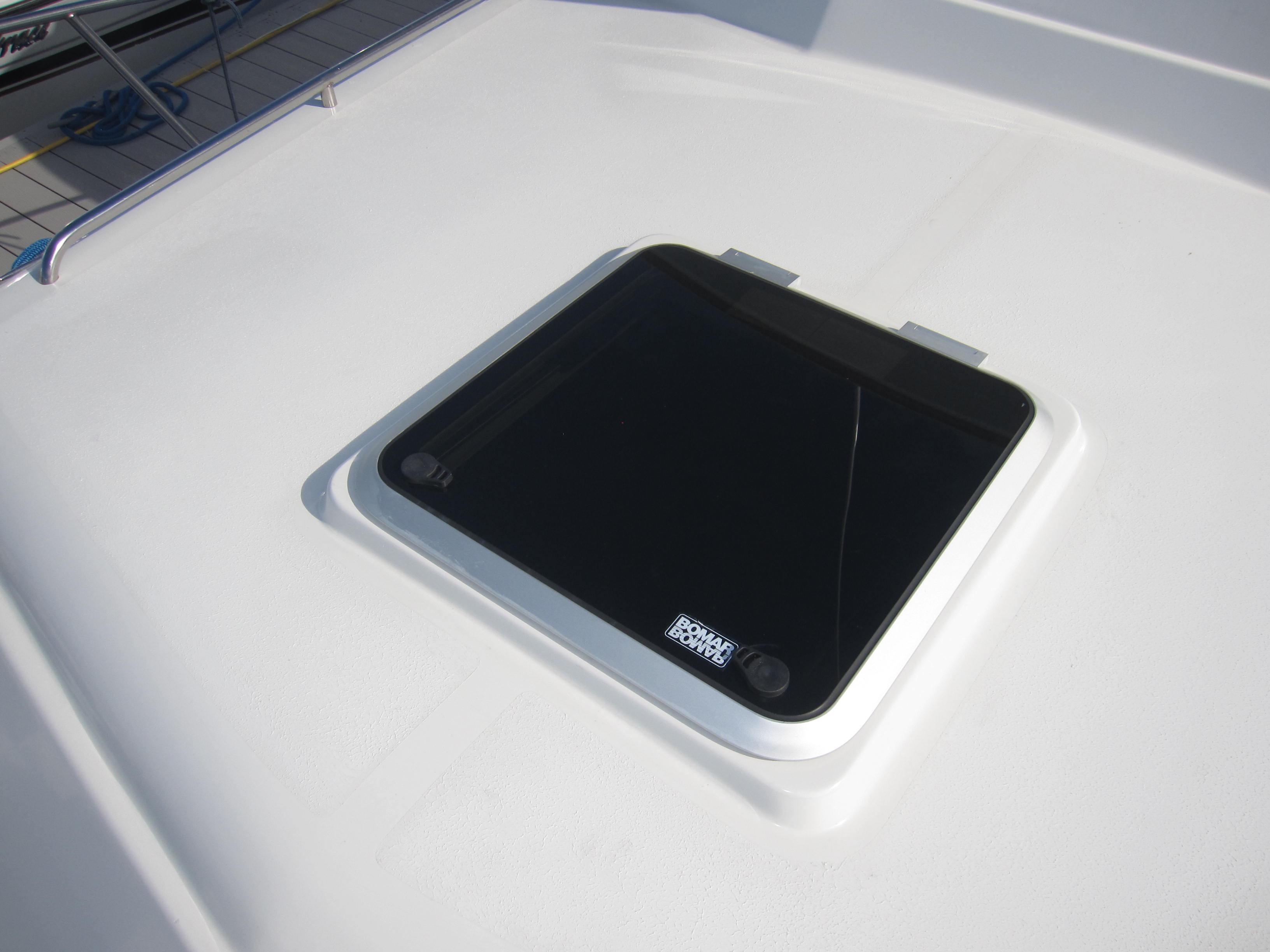 Deck hatch of a 1990 Blue Seas 31 Hardtop Cruiser.