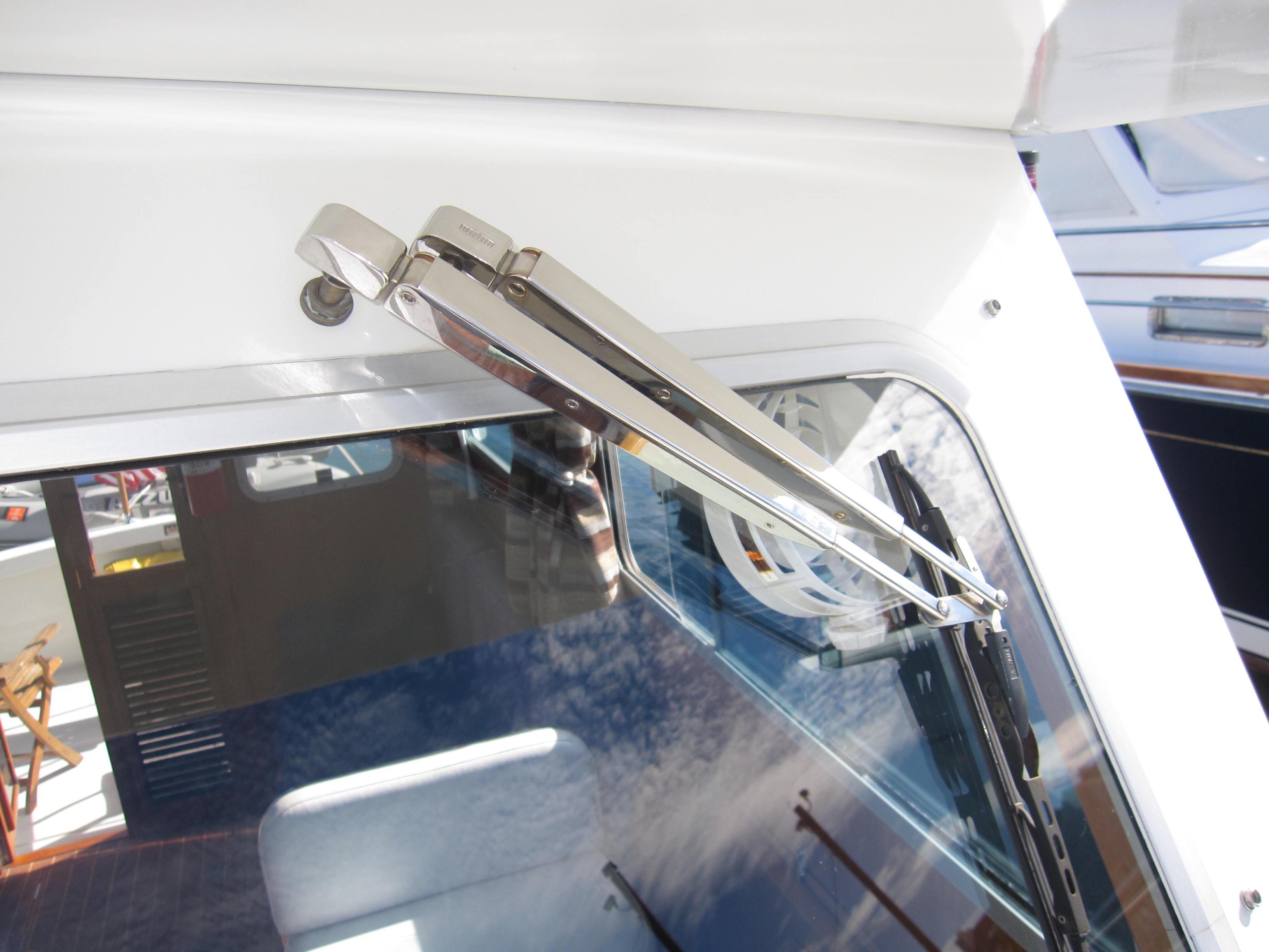 Close-up of windshield wiper on 1990 Blue Seas 31 Hardtop Cruiser boat.
