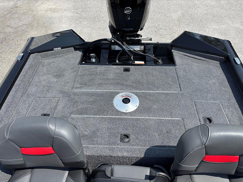 2025 Tracker Pro Team 175 Crappie Edition boat interior with gray carpet and seating.