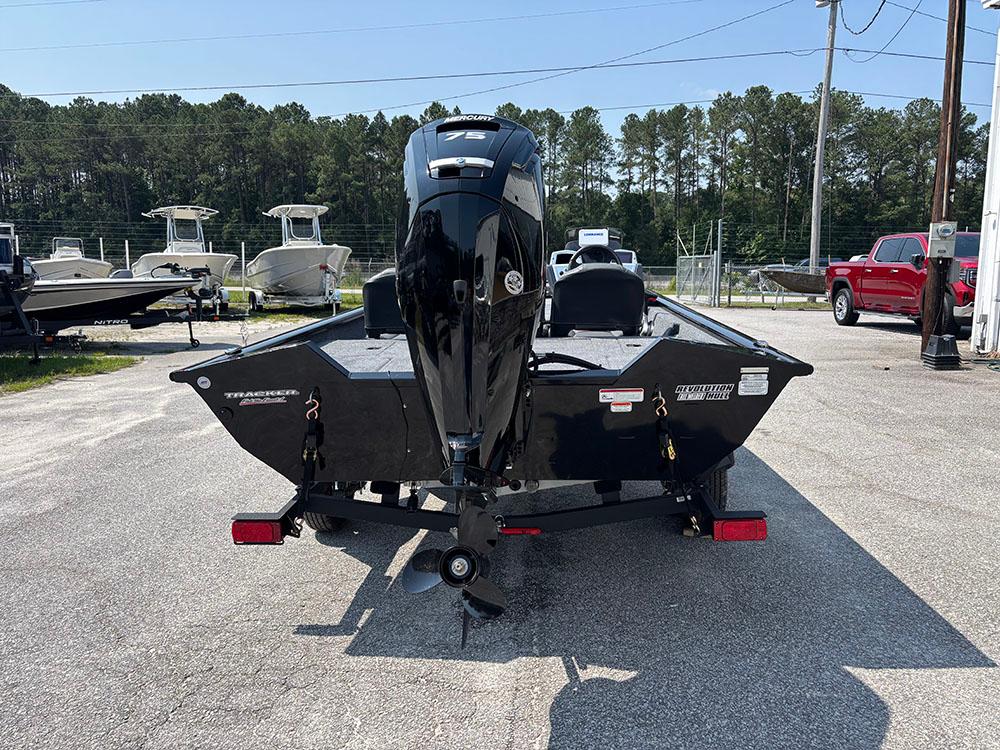 2025 Tracker Pro Team 175 Crappie Edition boat, rear view, parked outdoors.