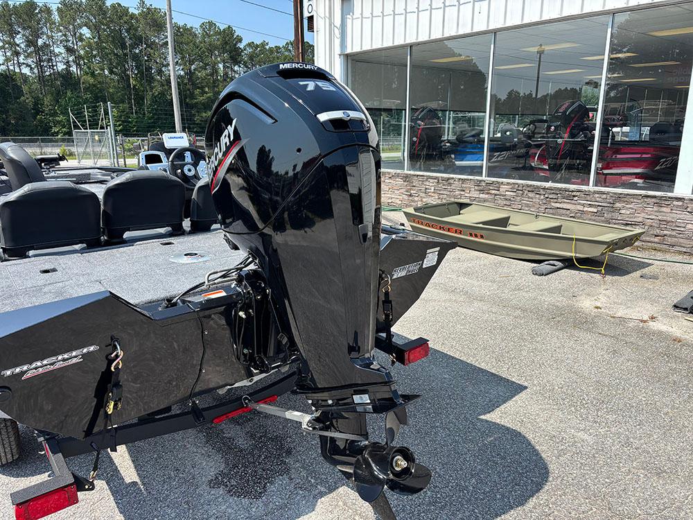 2025 Tracker Pro Team 175 Crappie Edition boat with Mercury engine, parked outdoors.