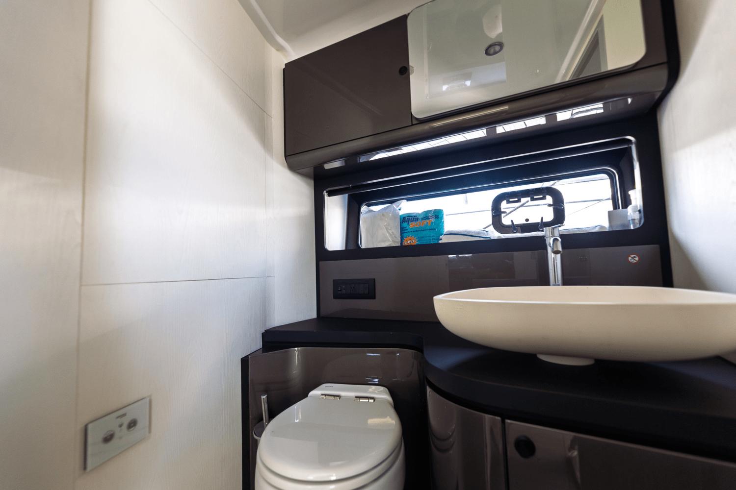Azimut-AZ42 VERVE 2023-Shee-naughty TX-US-Modern bathroom in 2023 Azimut AZ42 VERVE yacht with sleek fixtures and elegant design.-9104707 | Thumbnail