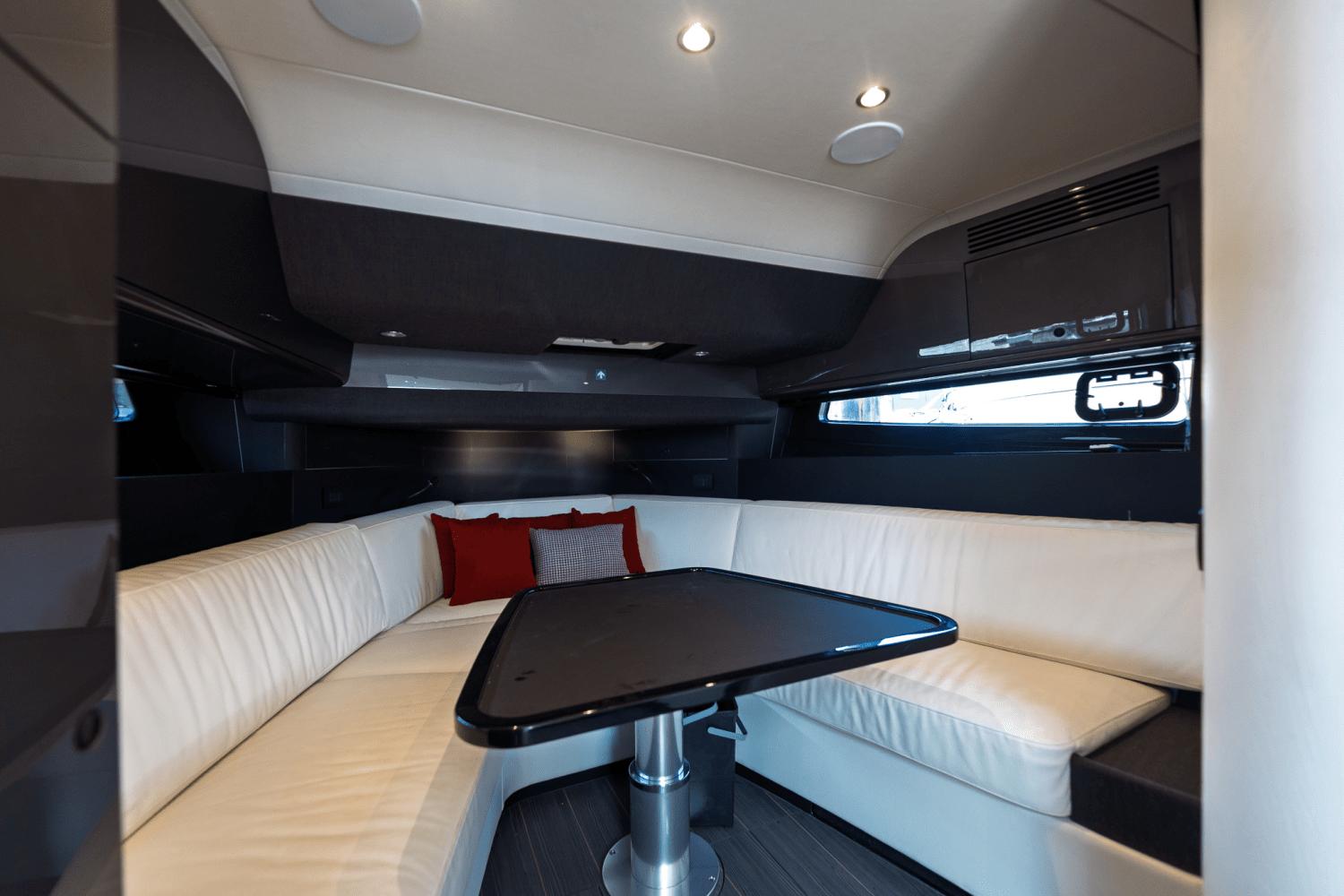 Azimut-AZ42 VERVE 2023-Shee-naughty TX-US-Luxurious interior of 2023 Azimut AZ42 VERVE yacht with white seating and modern table.-9104707 | Thumbnail