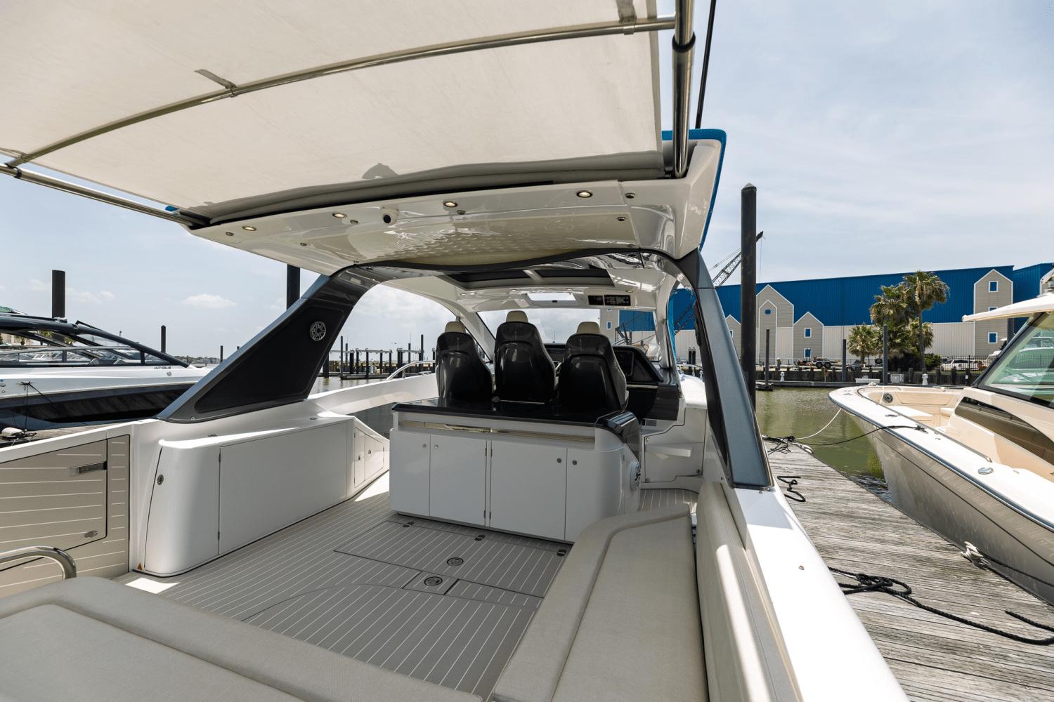 Azimut-AZ42 VERVE 2023-Shee-naughty TX-US-2023 Azimut AZ42 VERVE luxury yacht interior at marina, featuring sleek seating and modern design.-9104707