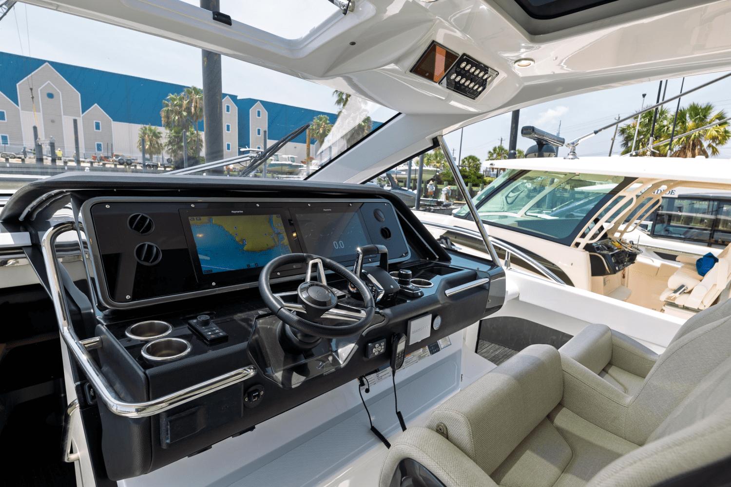 Azimut-AZ42 VERVE 2023-Shee-naughty TX-US-2023 Azimut AZ42 VERVE yacht cockpit with modern navigation system and luxurious seating.-9104707 | Thumbnail