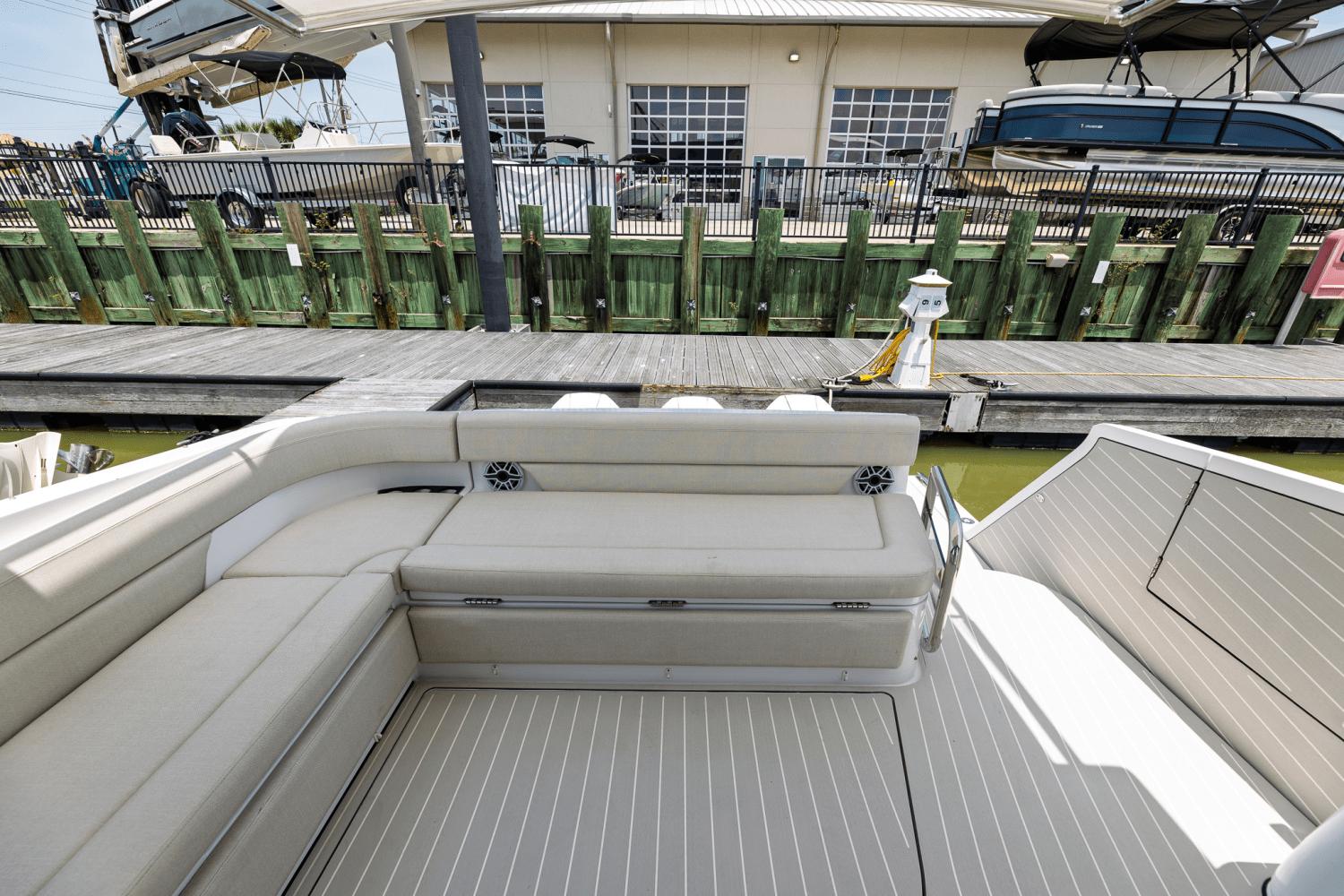 Azimut-AZ42 VERVE 2023-Shee-naughty TX-US-2023 Azimut AZ42 VERVE yacht interior with sleek seating and dock view.-9104707 | Thumbnail