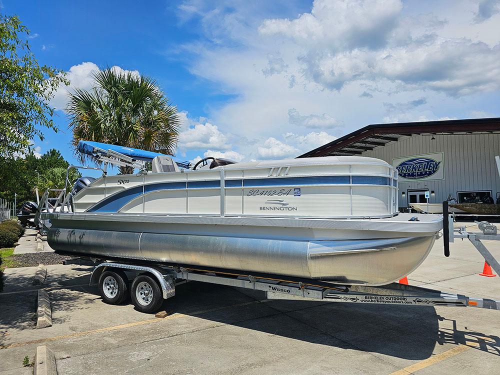 2022 Bennington 22 SXSB pontoon boat on trailer at Berkeley Outdoors.