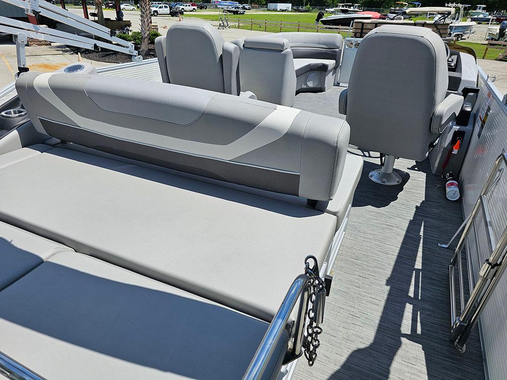 2022 Bennington 22 SXSB pontoon boat interior with gray seating and helm.