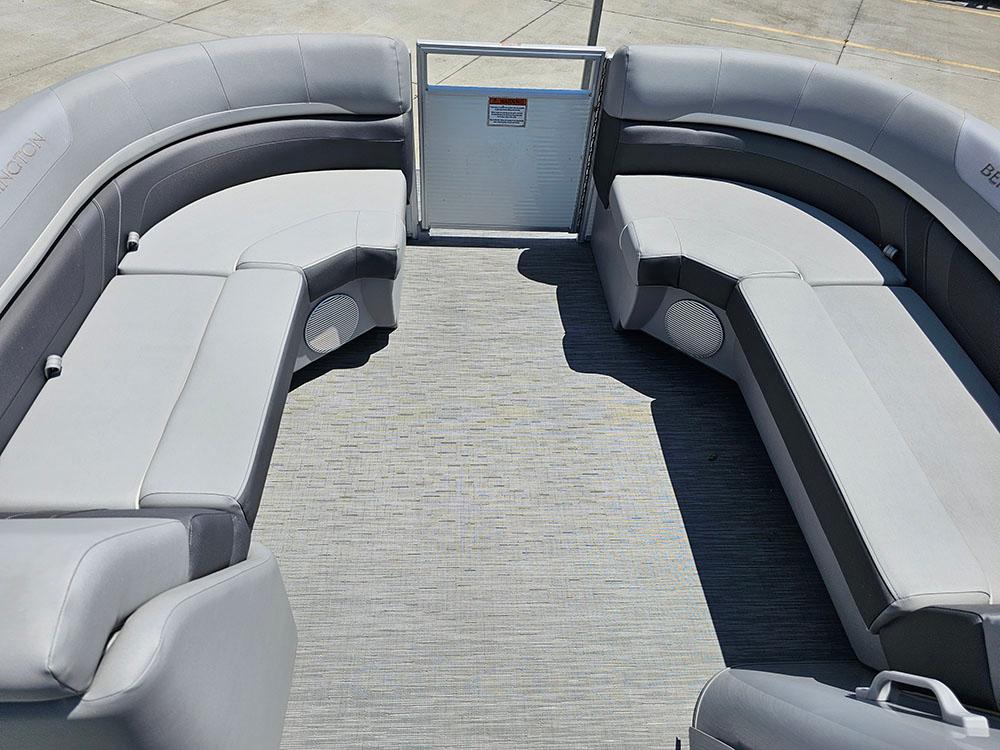 2022 Bennington 22 SXSB boat interior with gray seating and spacious layout.