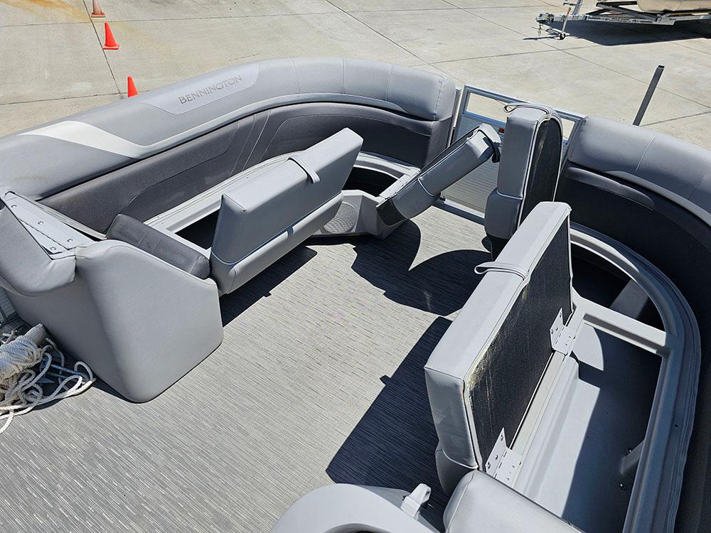 2022 Bennington 22 SXSB boat interior with gray seating and open deck layout.