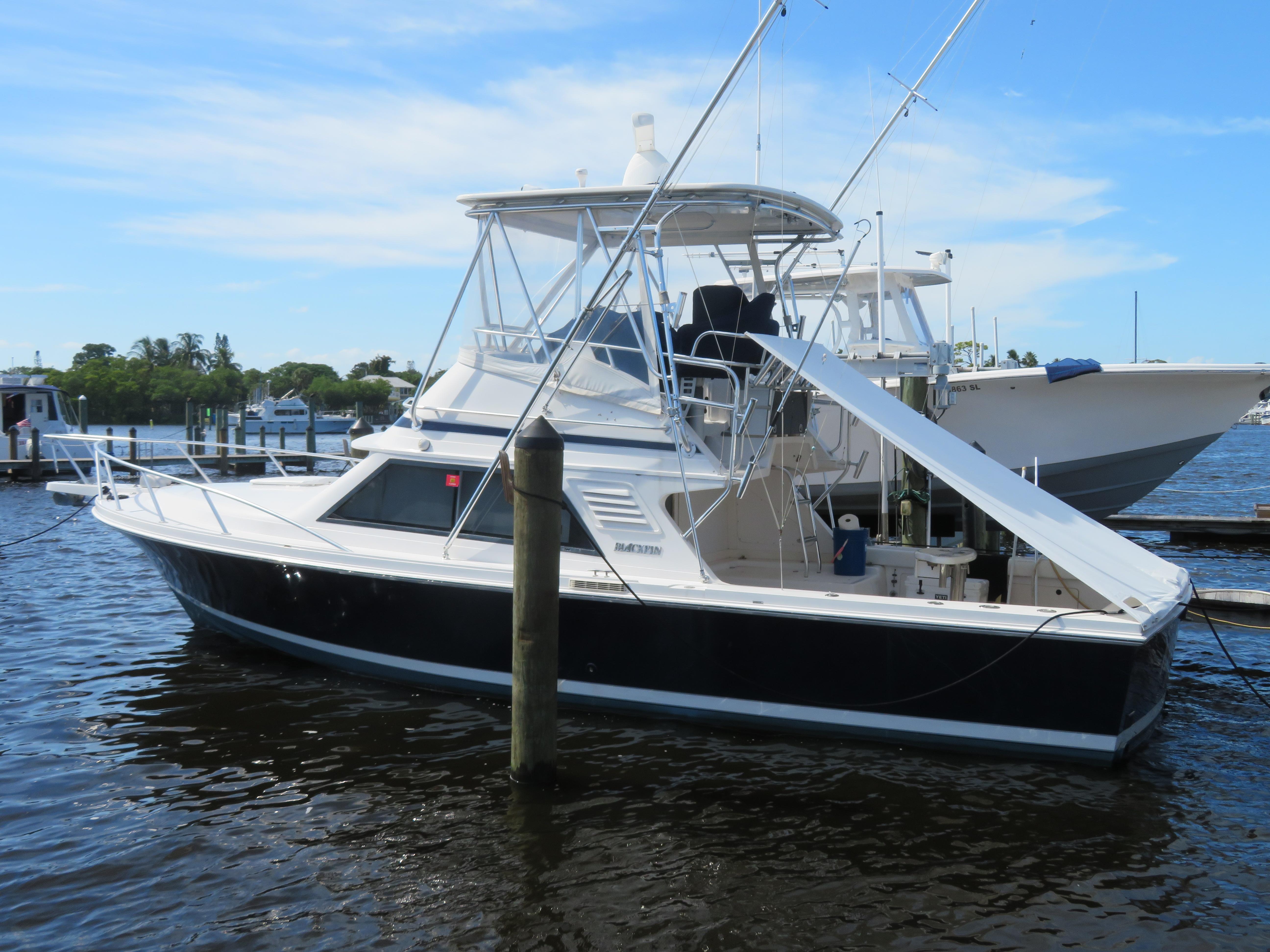 Blackfin 33 Plumb Crazy - Profile at Dock