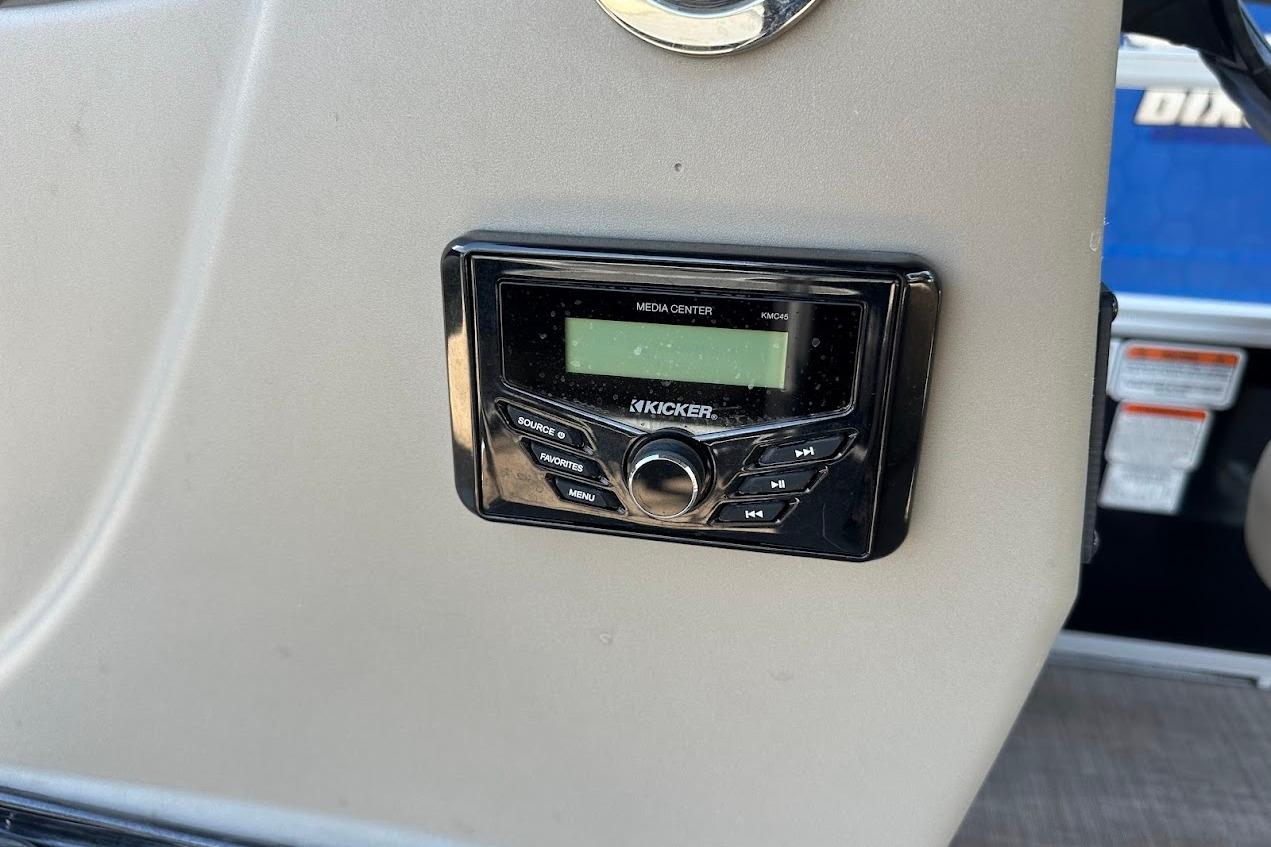 Kicker media center on 2022 Sun Tracker Bass Buggy 18 DLX boat dashboard.