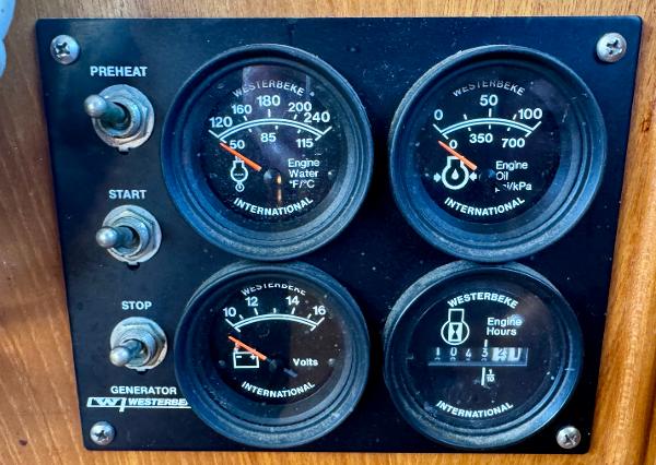 1979 Grand Banks Classic control panel with Westerbeke gauges and switches.