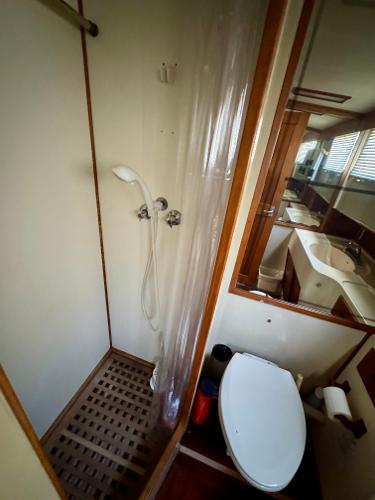 1979 Grand Banks Classic yacht bathroom with shower and toilet.
