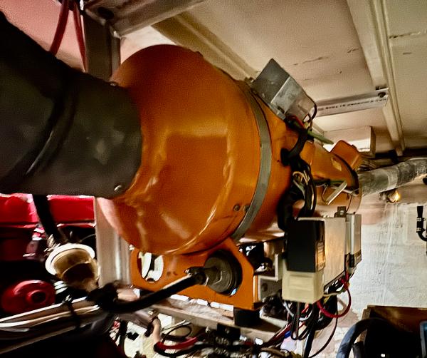 Engine room of 1979 Grand Banks Classic boat with visible machinery and wiring.