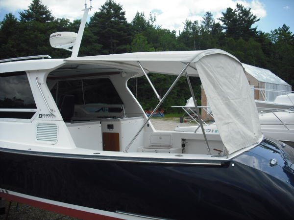 Side shot /w Bimini and privacy screen