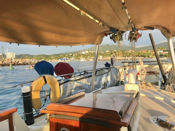 Salar 40 sailboat from 1975 docked in a scenic marina setting.
