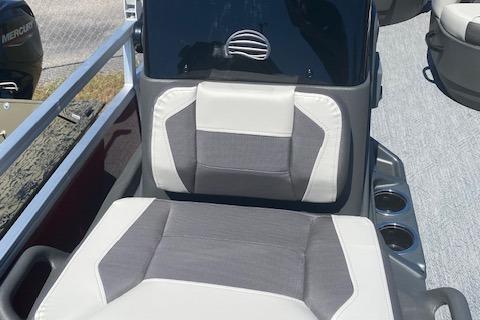 2026 Sun Tracker Bass Buggy 18 DLX boat seat with modern design and cup holders.
