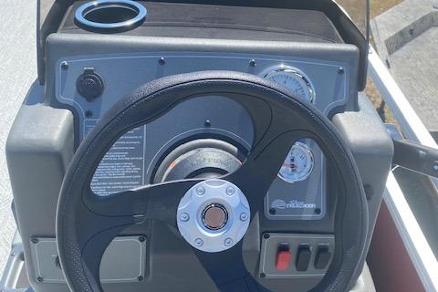 2026 Sun Tracker Bass Buggy 18 DLX steering console with gauges and controls.