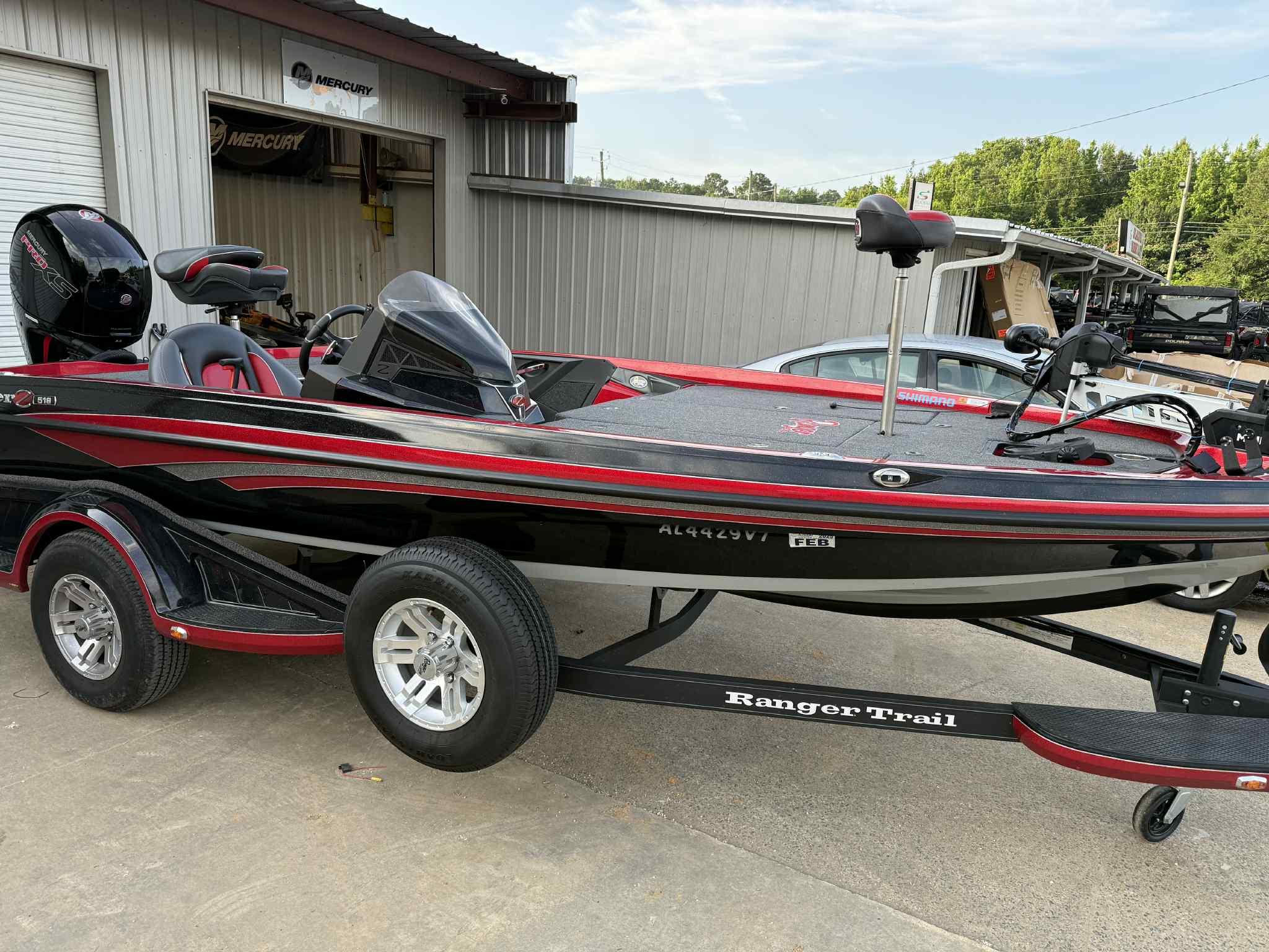 2022 Ranger Z518 boat on trailer, parked outside a Mercury dealership.