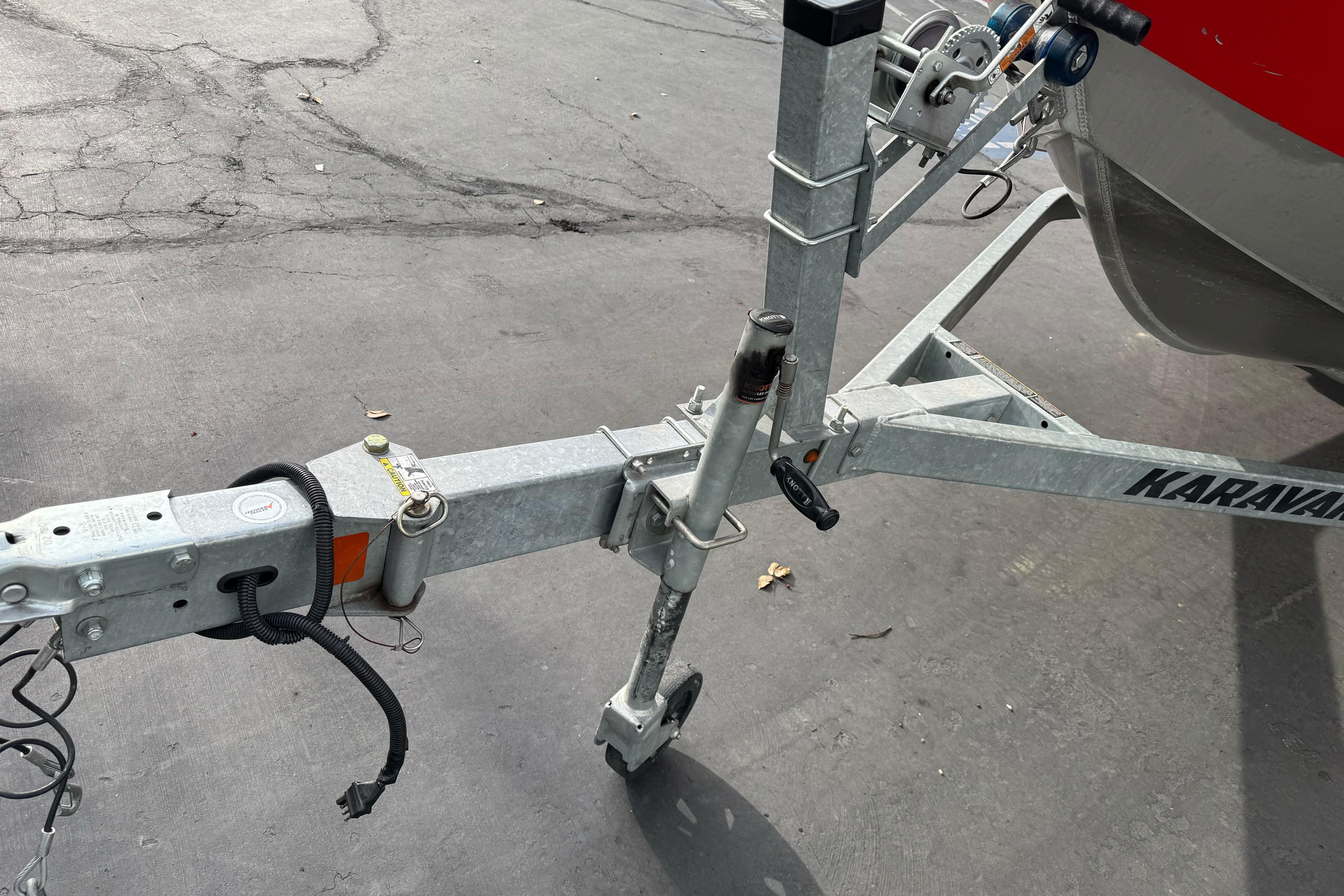 Trailer hitch of a 2018 Fish Rite 16.5 Stalker boat on a Karavan trailer.