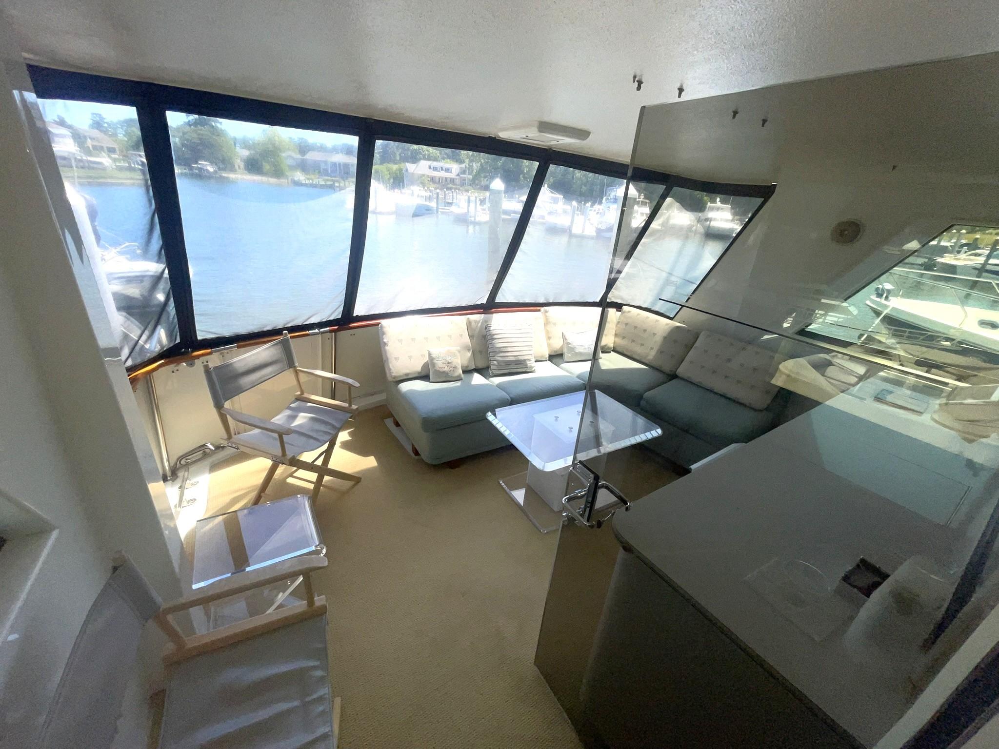 Hatteras-80 Cockpit Motor Yacht 1989-GENTLE BEN VA-US-ENCLOSED CLIMATE CONTROLLED AFT DECK OVERVIEW LOOKING AFT-9784968 | Thumbnail
