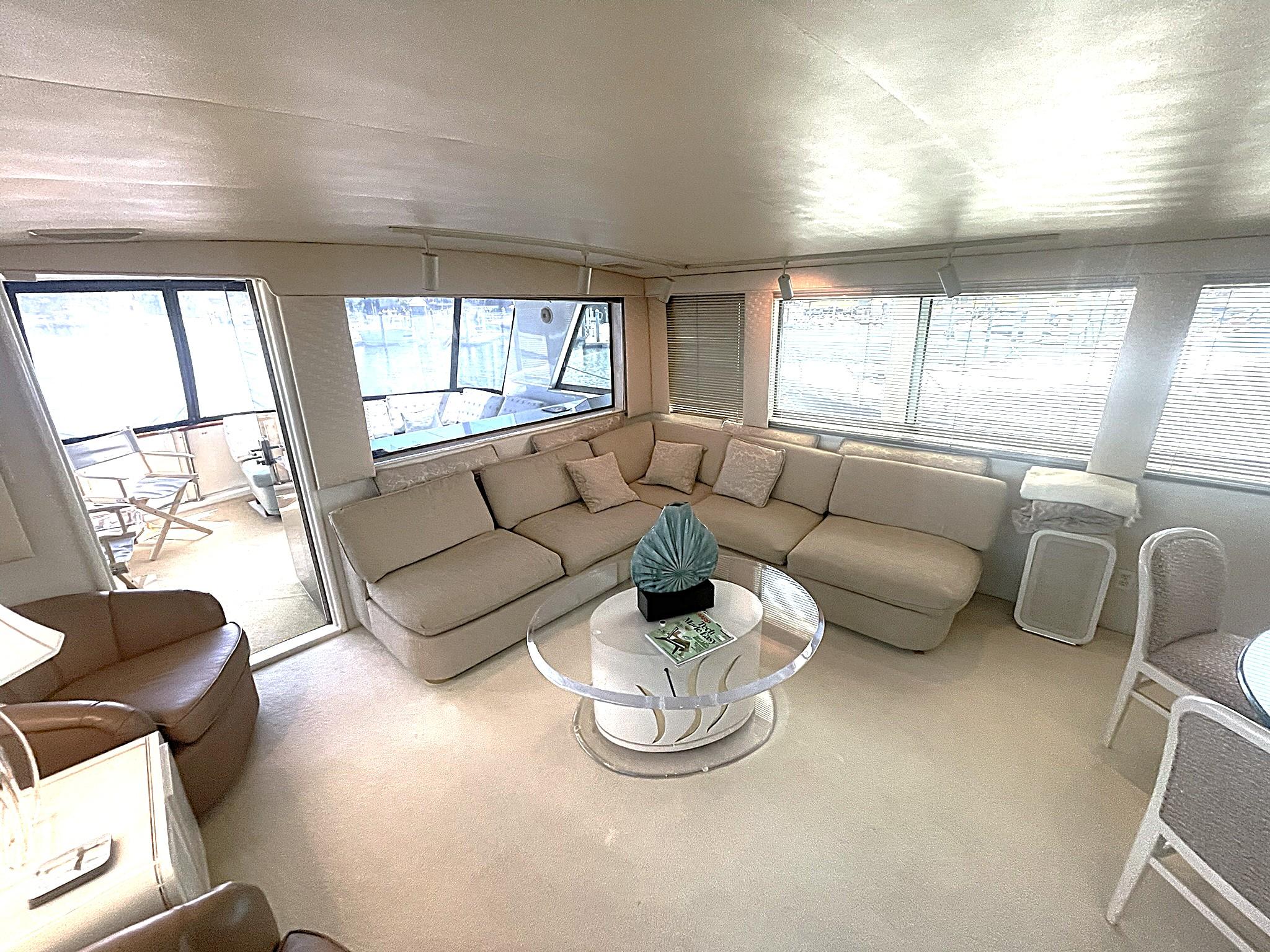Hatteras-80 Cockpit Motor Yacht 1989-GENTLE BEN VA-US-SALON AFT TO PORT L-SHAPED SOFA-9784968 | Thumbnail