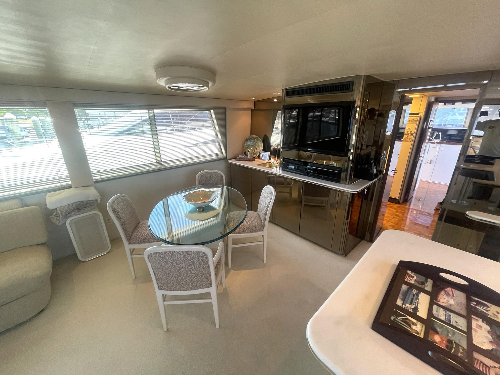 Hatteras-80 Cockpit Motor Yacht 1989-GENTLE BEN VA-US-SALON FORWARD TO PORT DINING TABLE-9784968 | Thumbnail