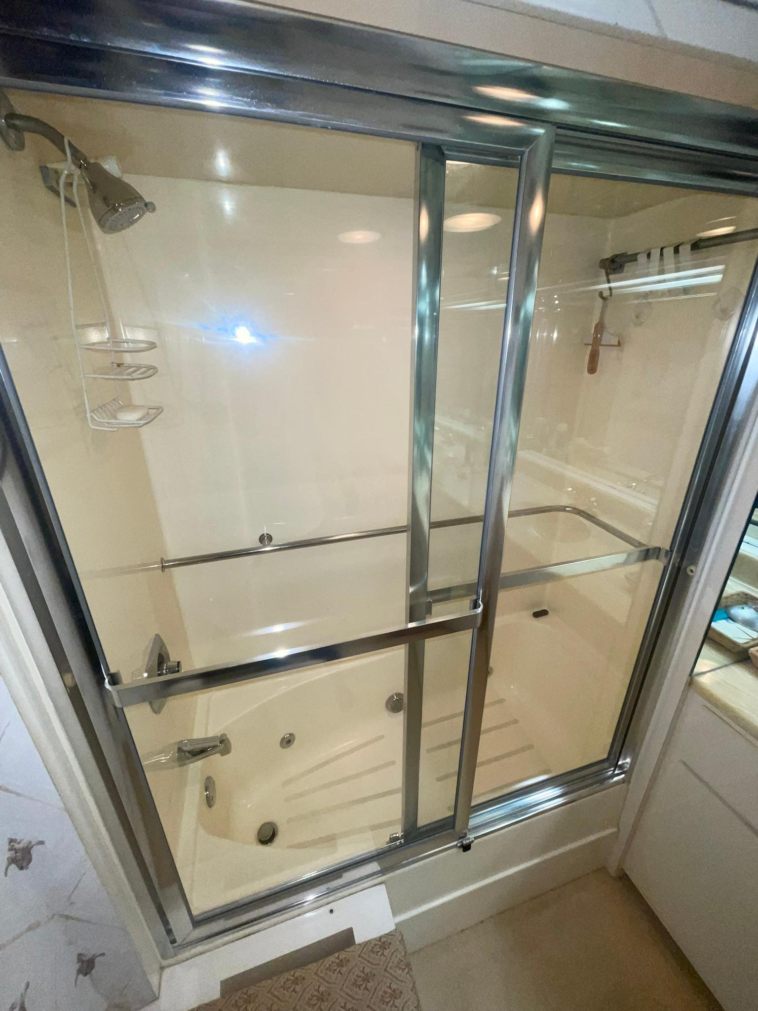 Hatteras-80 Cockpit Motor Yacht 1989-GENTLE BEN VA-US-MASTER STATEROOM STALL SHOWER WITH JACUZZI TUB-9784968 | Thumbnail