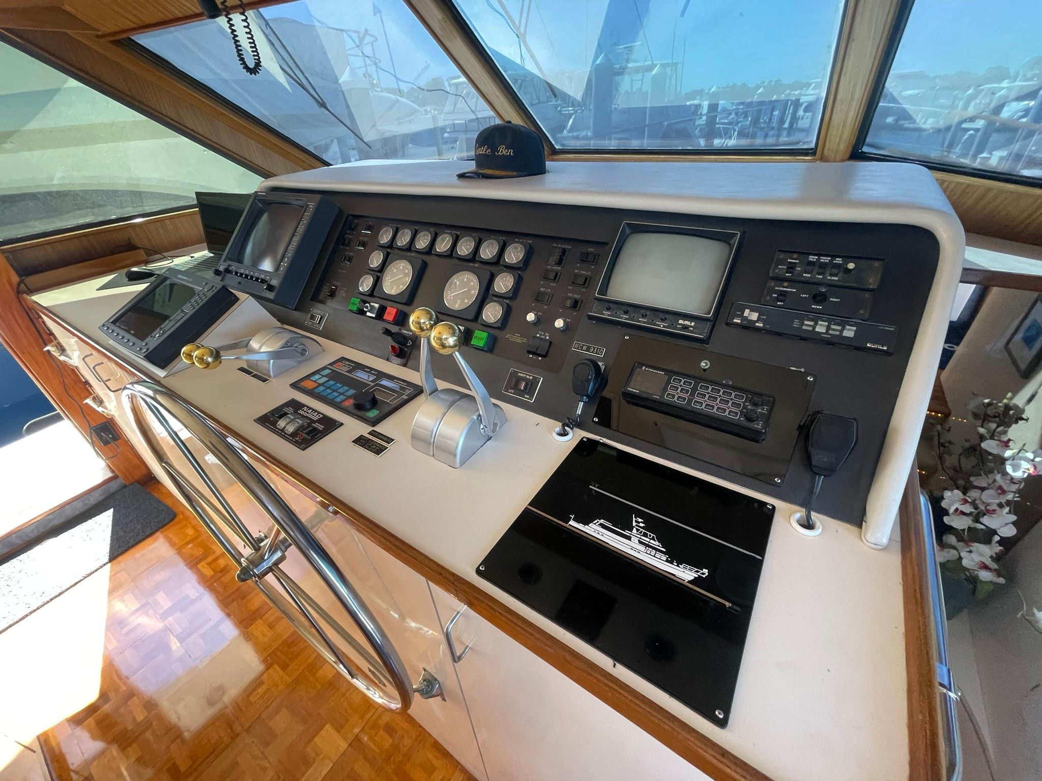 Hatteras-80 Cockpit Motor Yacht 1989-GENTLE BEN VA-US-Cockpit of 1989 Hatteras 80 Cockpit Motor Yacht with navigation instruments and steering wheel.-9784968 | Thumbnail