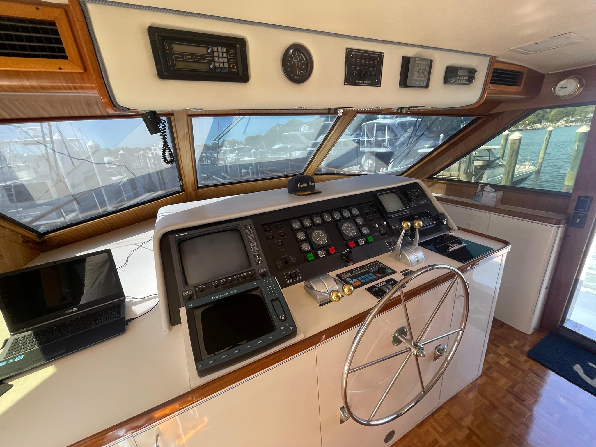 Hatteras-80 Cockpit Motor Yacht 1989-GENTLE BEN VA-US-Helm of 1989 Hatteras 80 Cockpit Motor Yacht with navigation equipment and steering wheel.-9784968 | Thumbnail