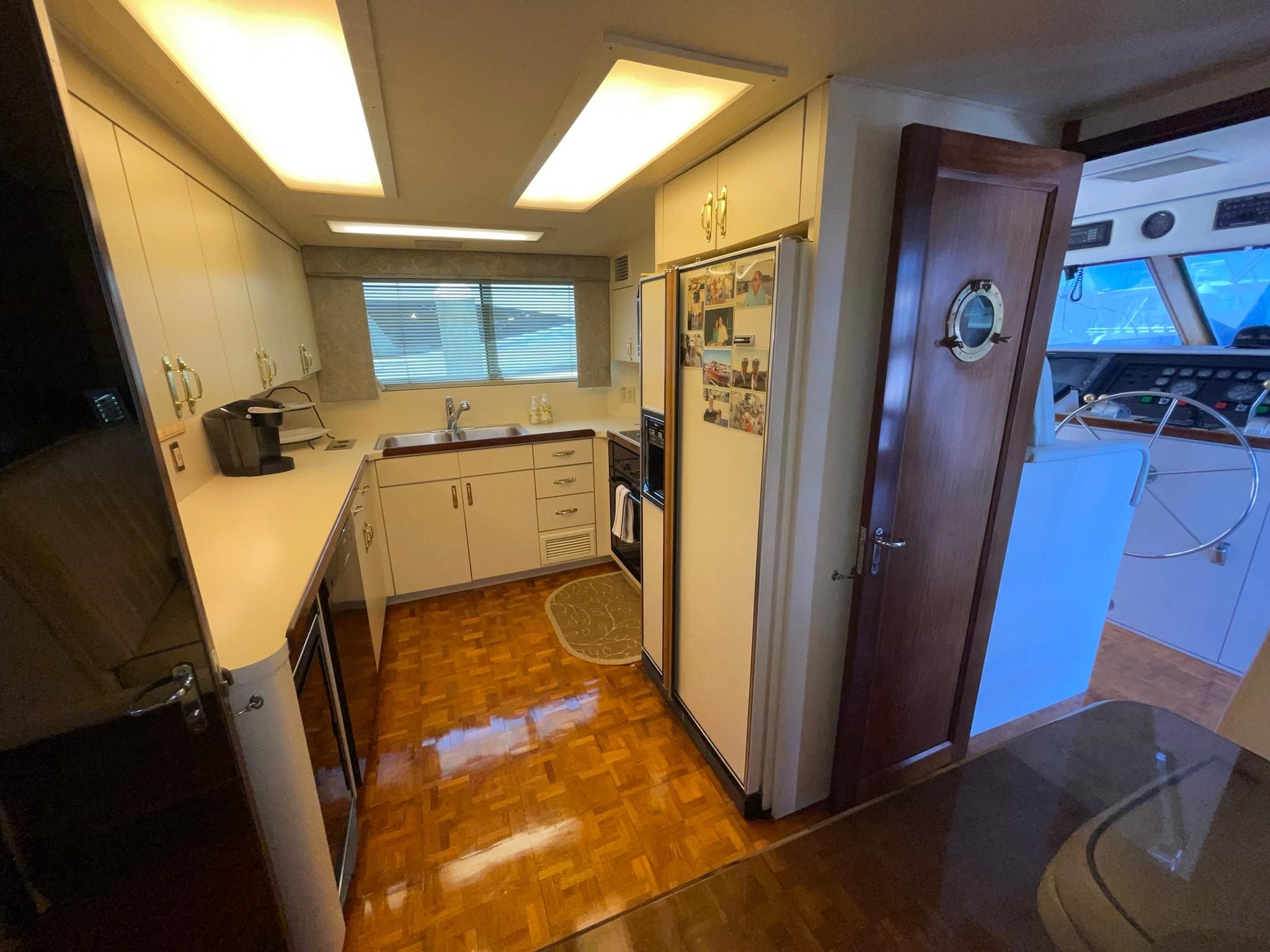 Hatteras-80 Cockpit Motor Yacht 1989-GENTLE BEN VA-US-GALLEY FORWARD OF SALON OVERVIEW-9784968 | Thumbnail