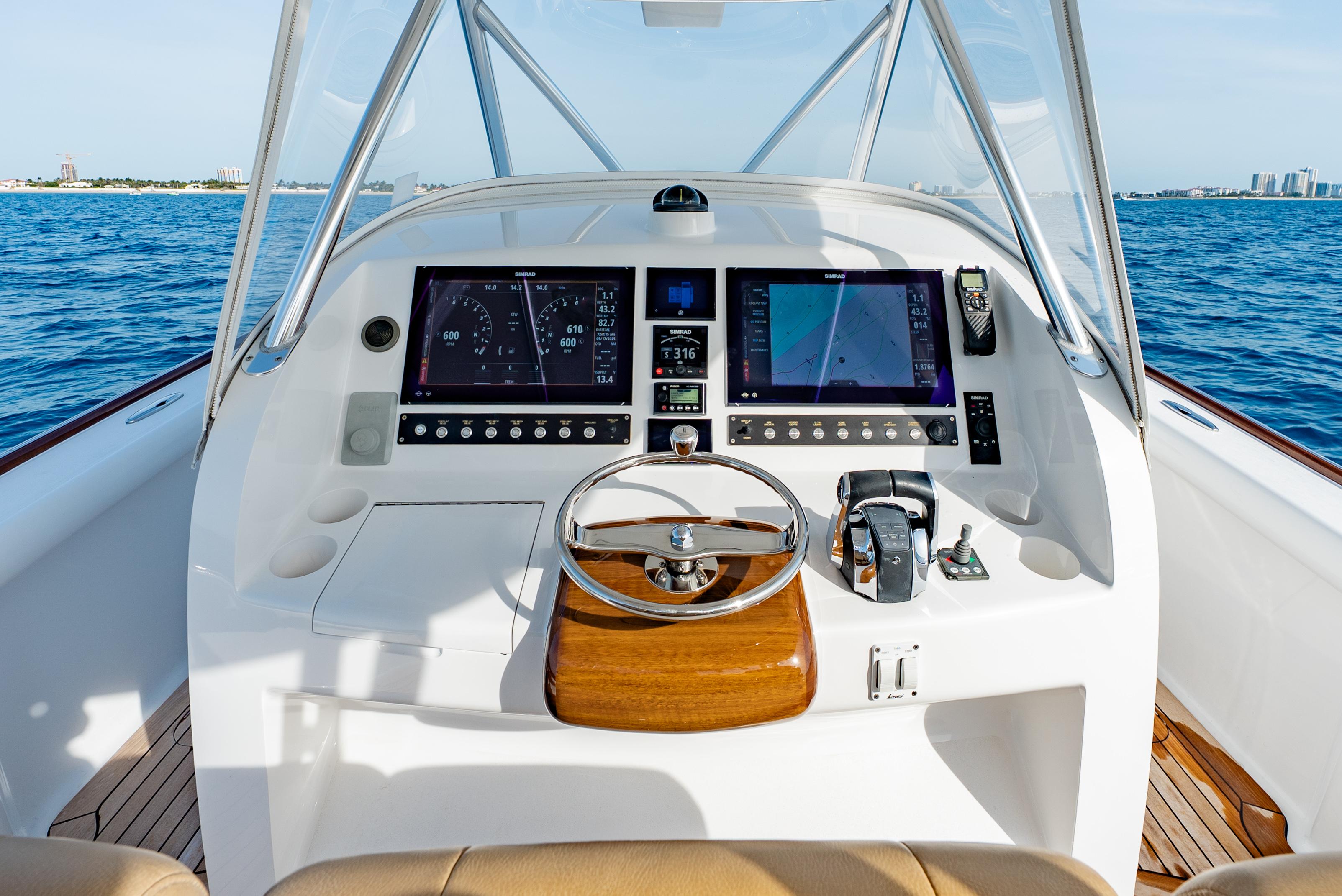 Winter Custom Yachts-37 Custom Carolina 2018-OFF COURSE (Name Reserved) FL-US-2018 Winter Custom Yachts 37 Custom Carolina helm with dual screens, steering wheel, and ocean view.-9832172 | Thumbnail