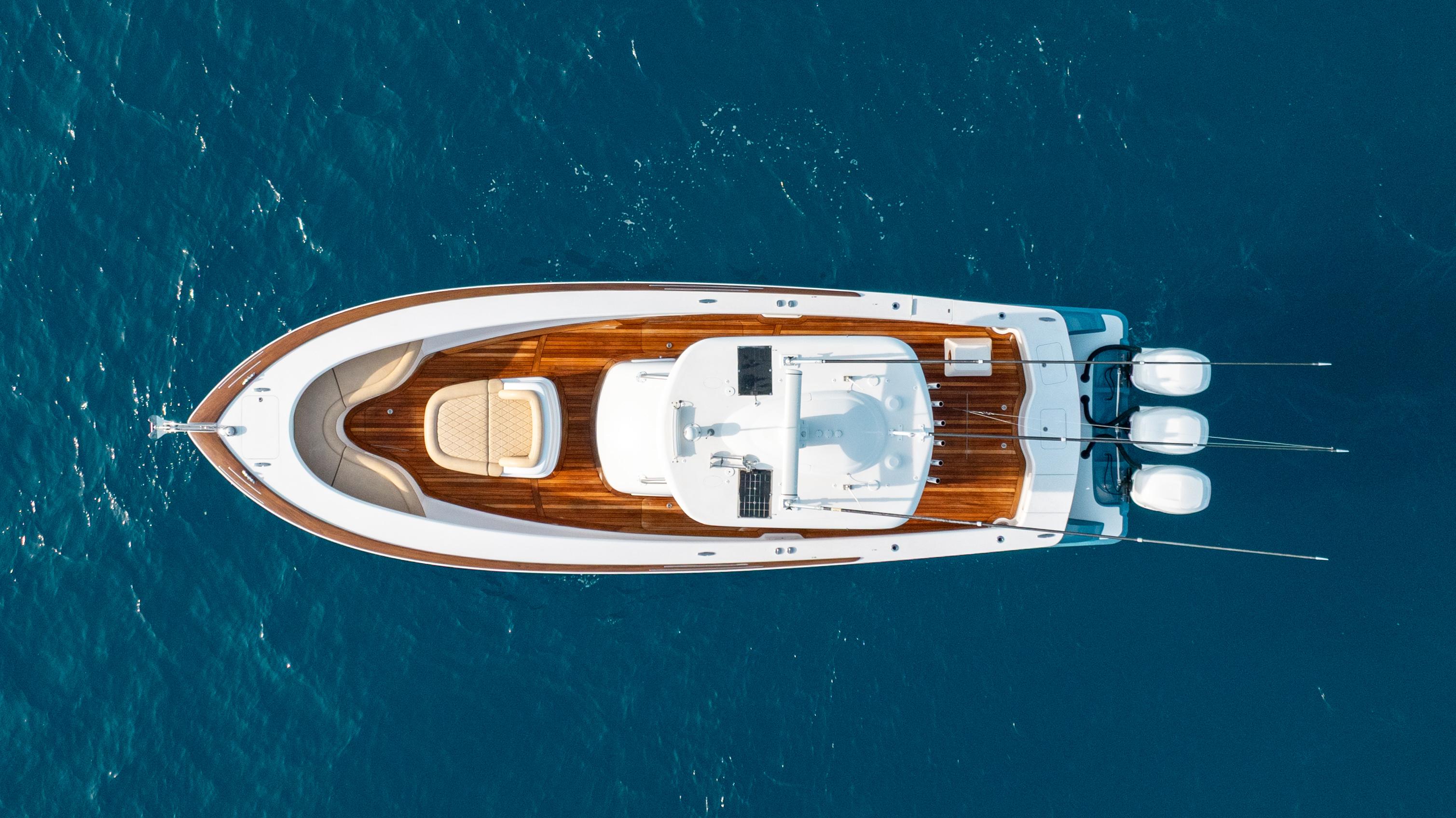 Winter Custom Yachts-37 Custom Carolina 2018-OFF COURSE (Name Reserved) FL-US-Aerial view of 2018 Winter Custom Yachts 37 Custom Carolina on blue ocean water.-9832172 | Thumbnail