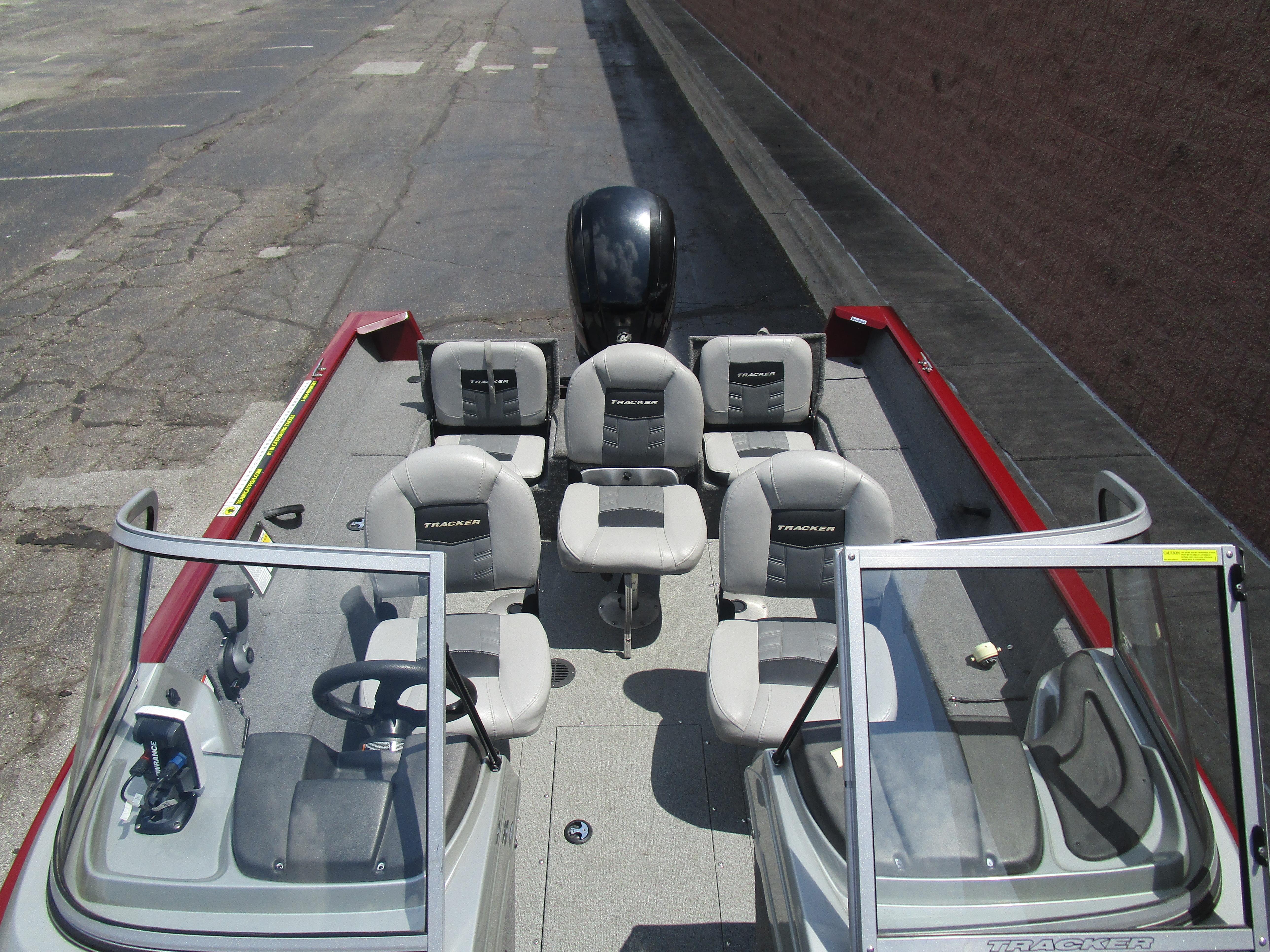 2017 Tracker PGV175 COMBO boat with multiple seats, steering console, and red accents.