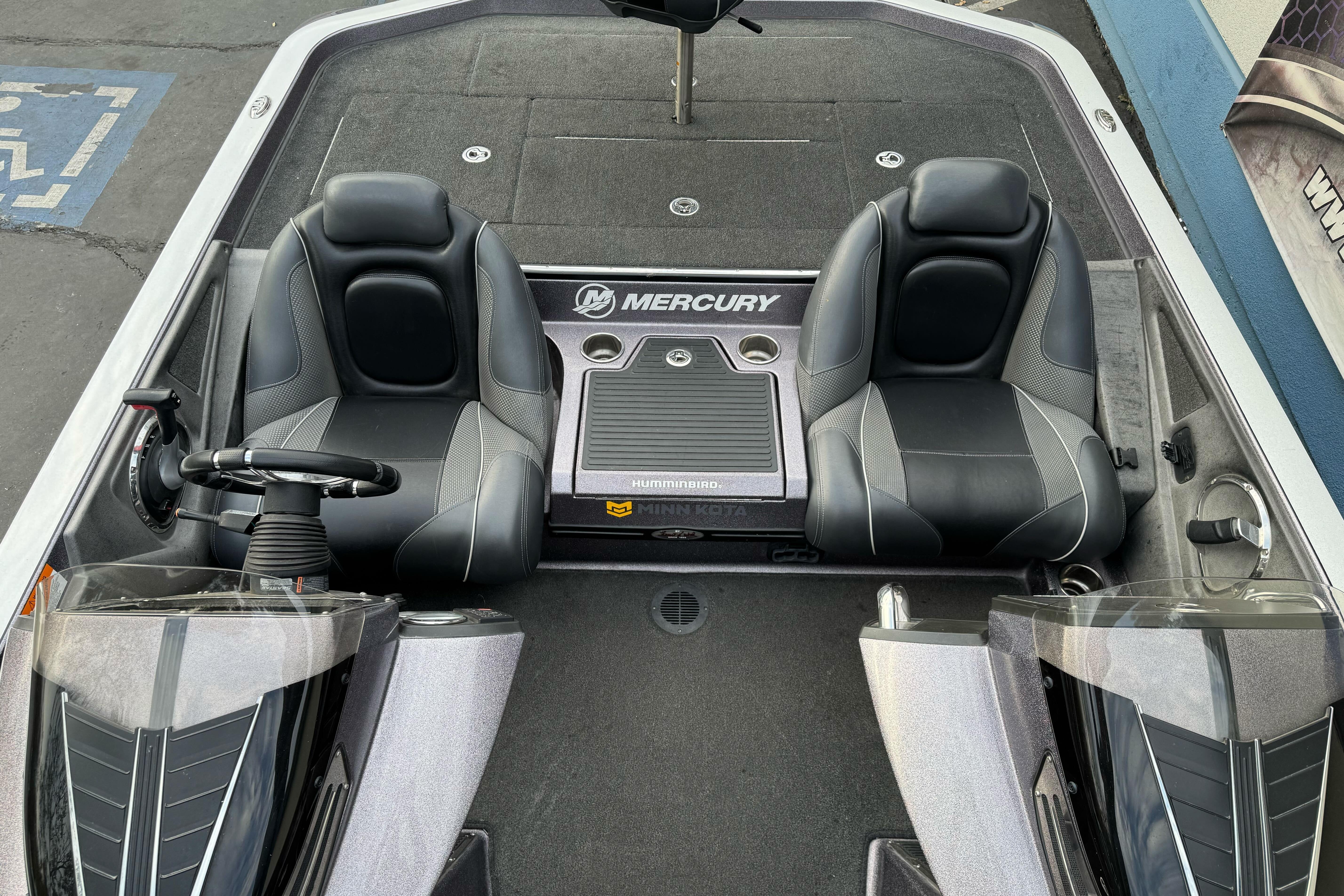 2016 Ranger Z521 Comanche boat interior with dual seats and Mercury branding.