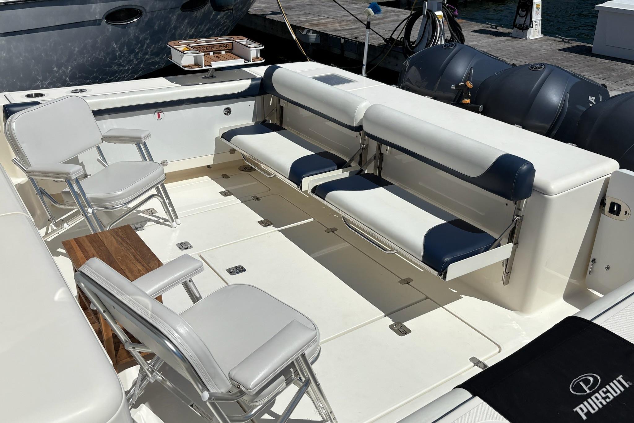 2009 Pursuit OS 375 Offshore boat interior with seating and deck details.