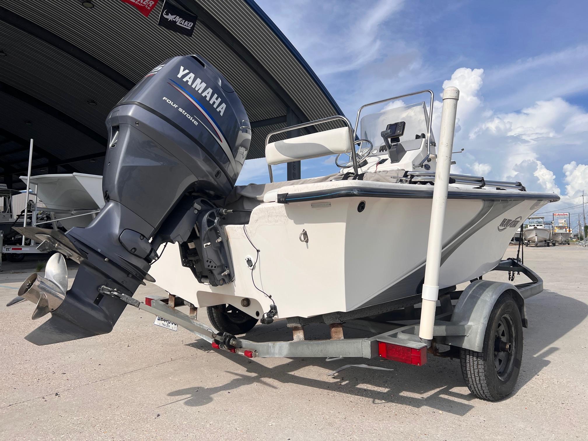 2010 Blue Wave 160 V Bay boat with Yamaha outboard motor on trailer.