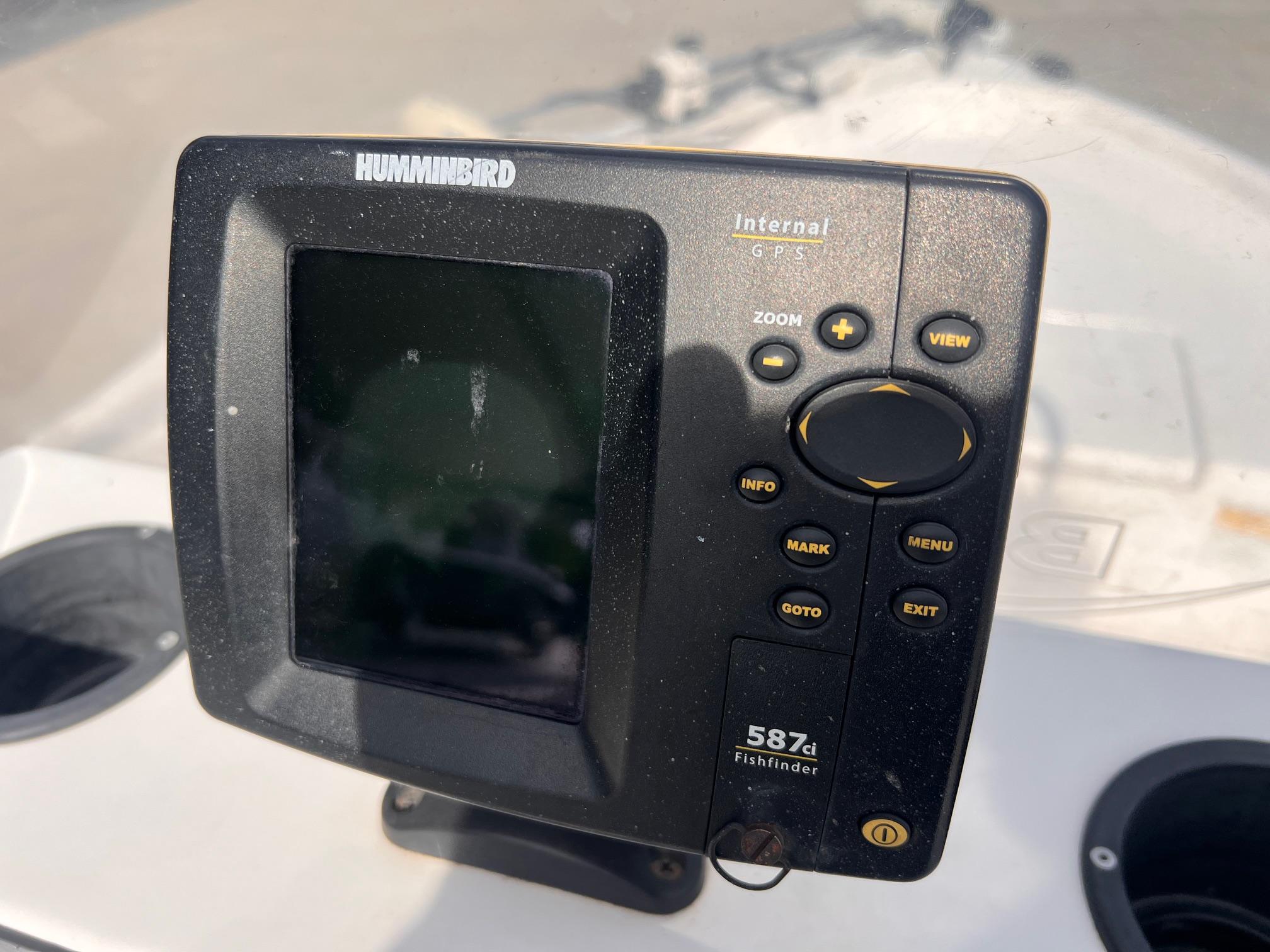 Humminbird fishfinder GPS on 2010 Blue Wave 160 V Bay boat dashboard.