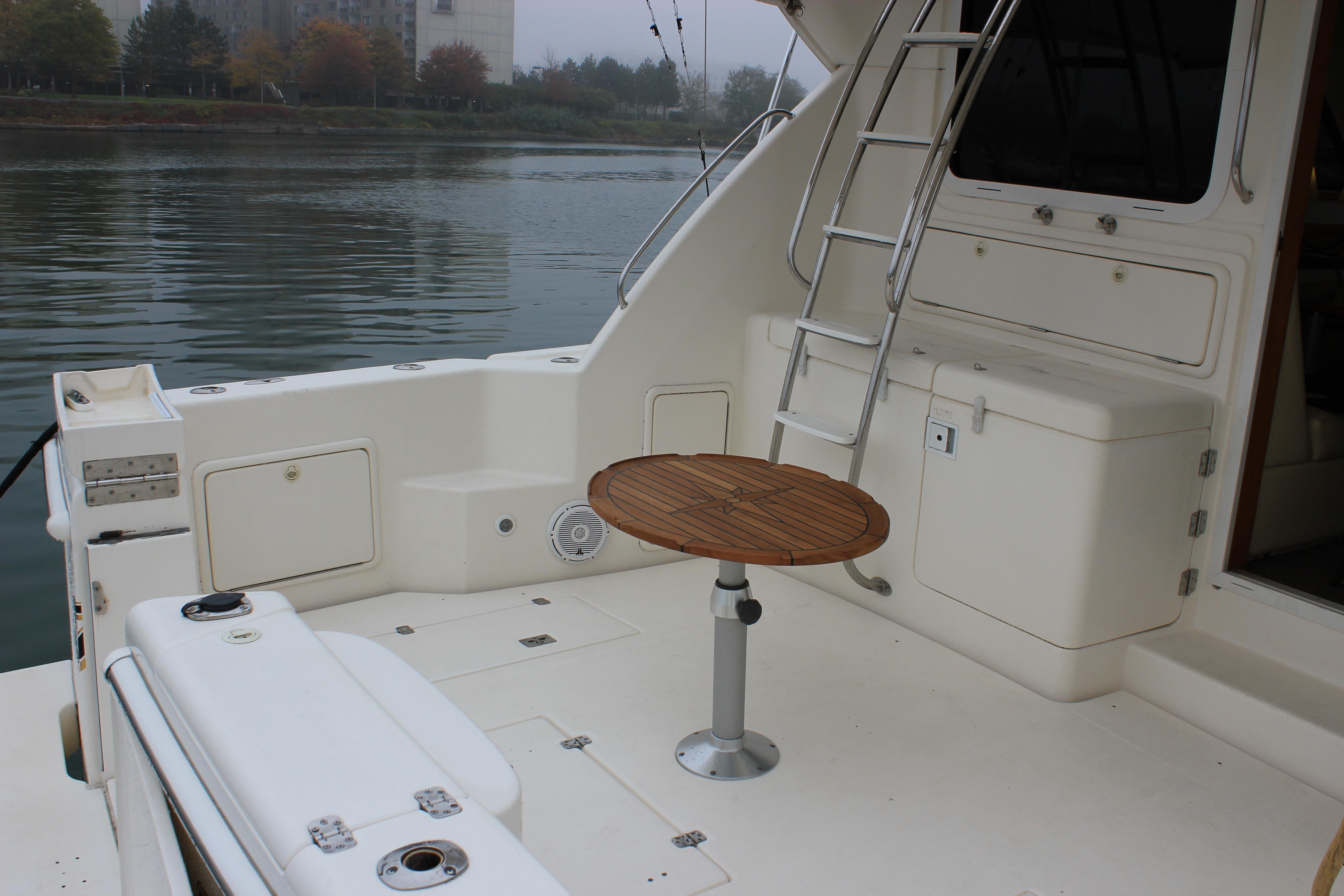 37 ft Riviera 37 Convertible Cockpit port with table