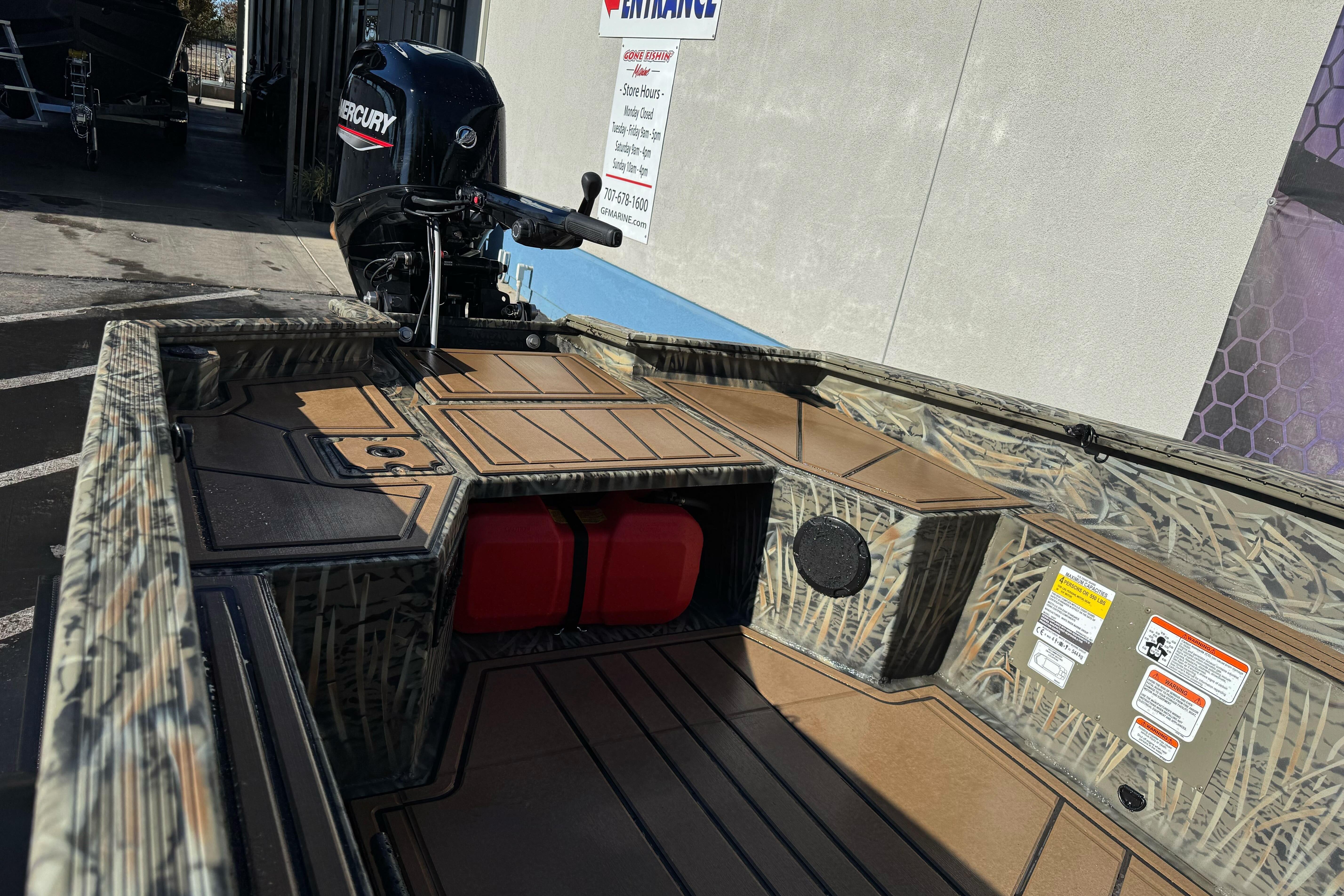 2026 Tracker Grizzly 1650 T Prairie Wings Edition boat with Mercury outboard motor.